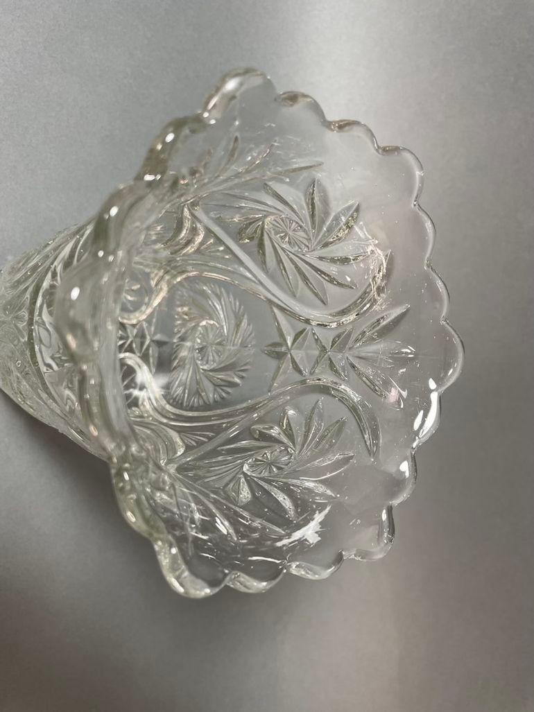 Vintage Brilliant luxurious cut glass vessel decorated throughout with geometric and starburst pattern
Mid Century Modern Collectible Vintage transparent clear cut glass vase offers flared and scalloped rim with stylized design surmounting star