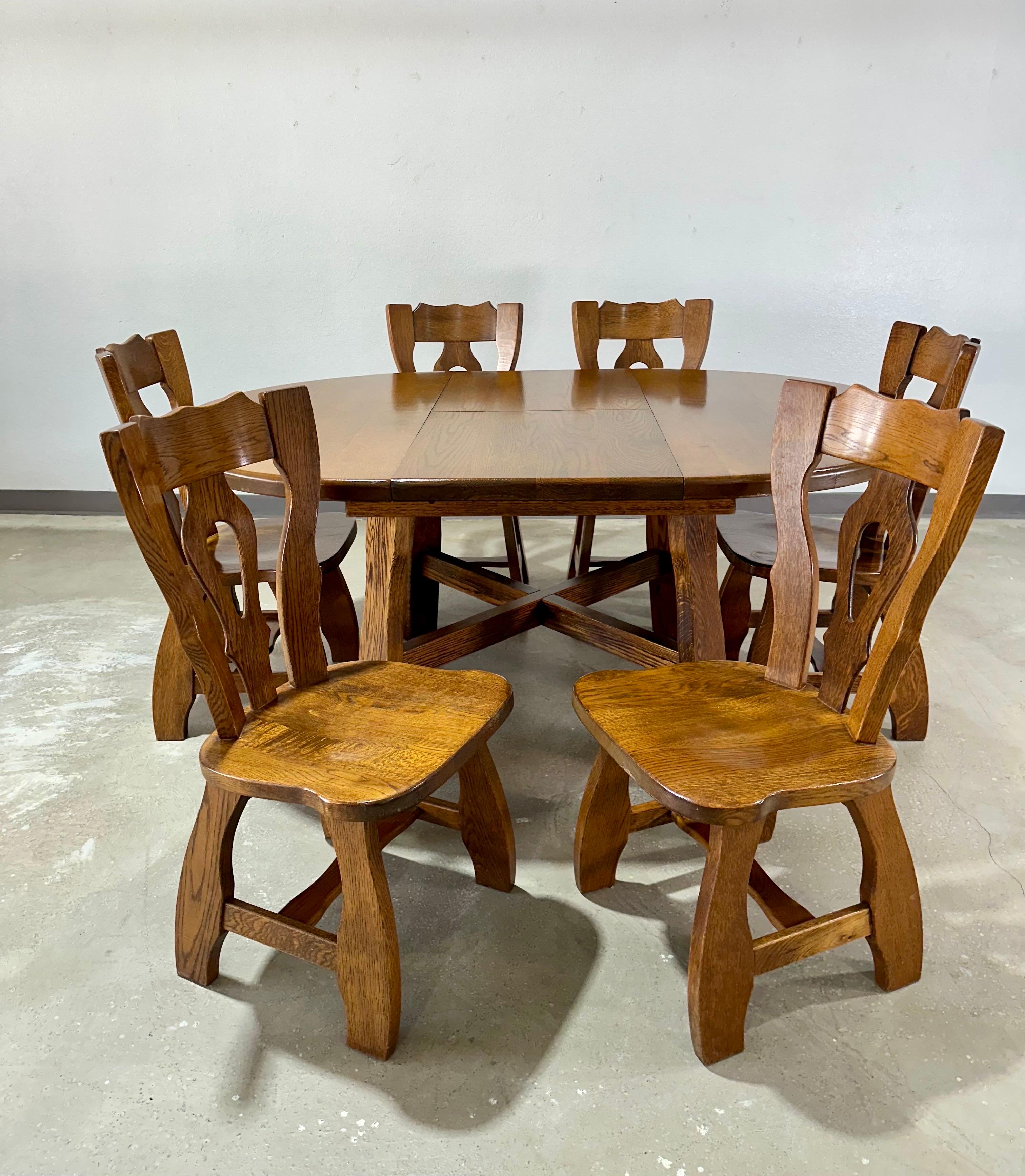 Vintage Oak Brutalist Dining Set circa 1970’s, in the style of Guillerme et Chambron, Maker Unknown. Purchased by original owner in Mainz-Kastel Germany in the 1970’s during his deployment and brought back with him to the US. Constructed of solid