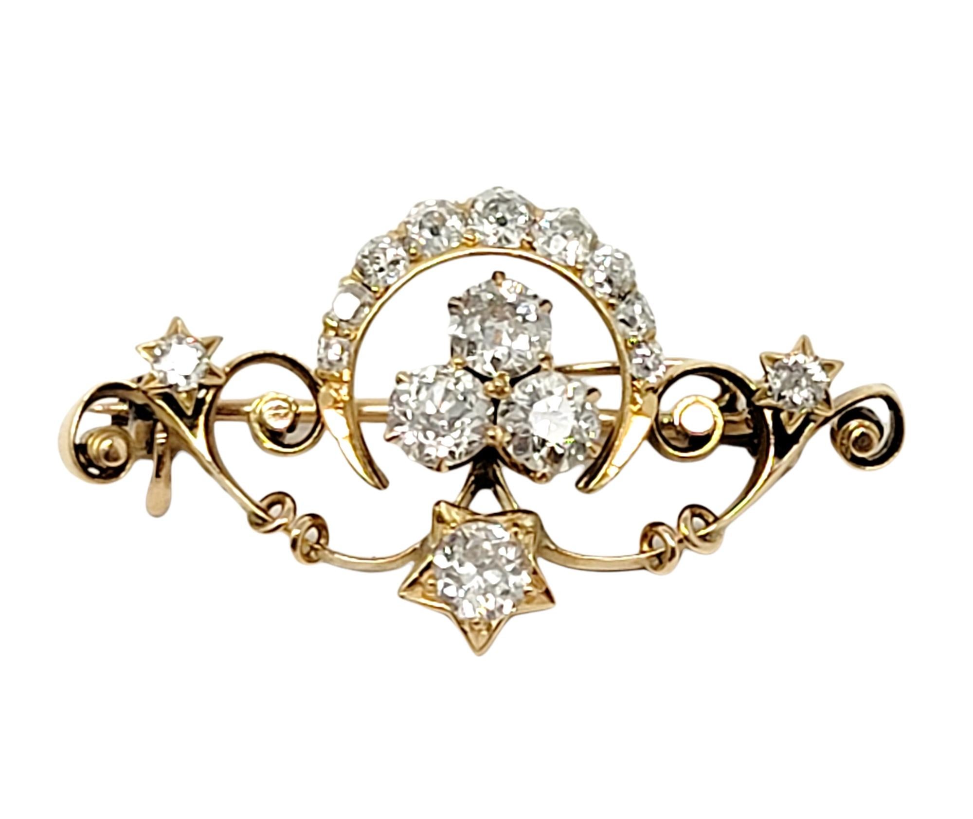 Stunning vintage brooch with a unique celestial design and glittering natural diamonds.

Metal: 14 Yellow Gold
Closure: Hinged stick pin
Natural Diamonds: 1.13 ctw 
Diamond Cut: Old European
Diamond Color: G-H
Diamond Clarity: VS1-VS2
Length: