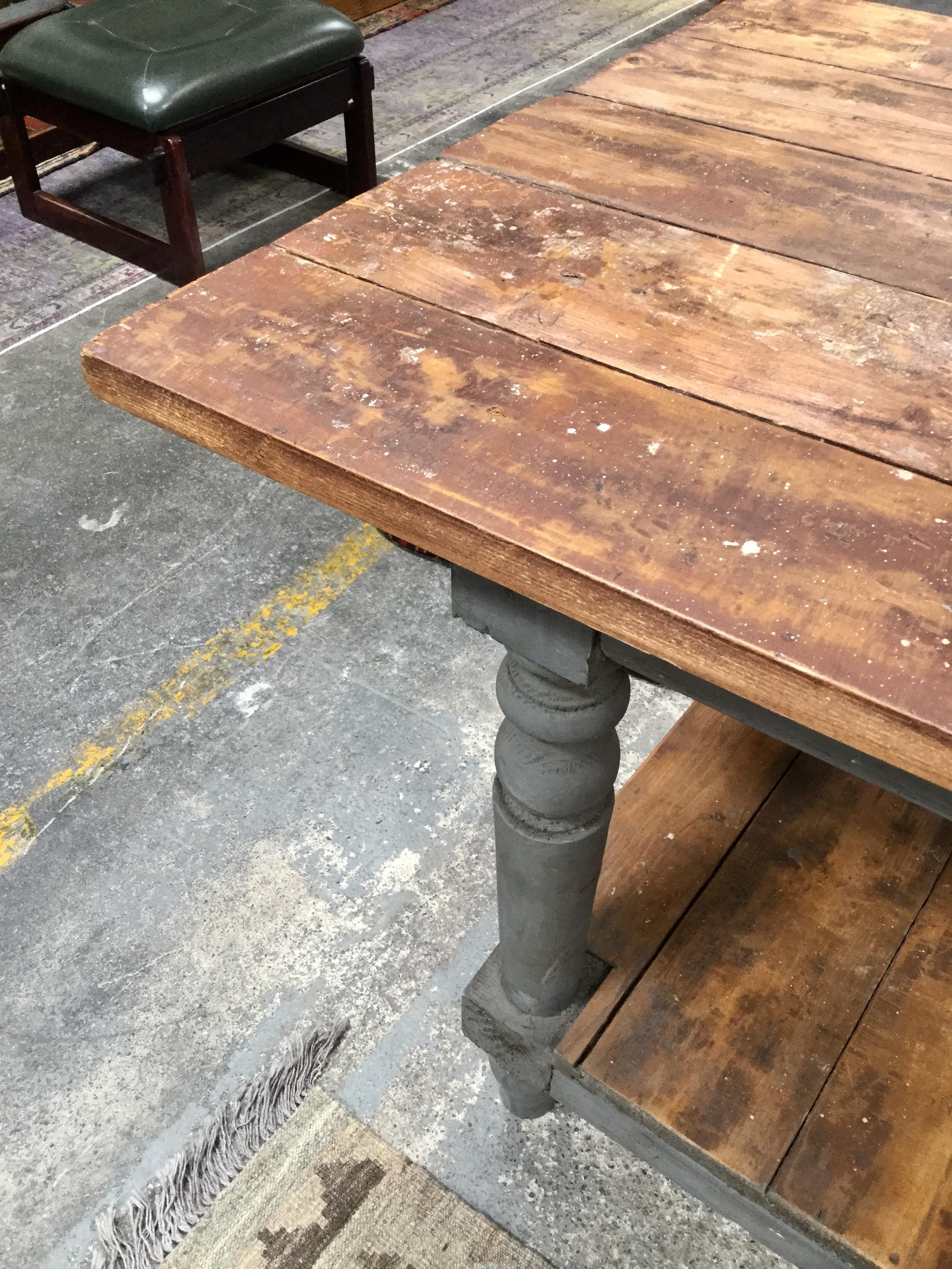 Rustic and hearty European farm table with lived-in character! Spacious wooden surface, ideal for group or large projects around the kitchen or garden. Please note, this is a special and aged item, and the surface shows plenty of proof of its past