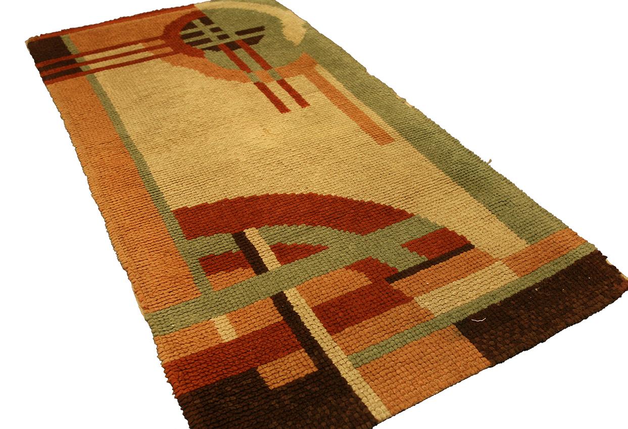 Woven in Europe between 1920 and 1950, despite its age this carpet measuring 137 × 70 cm (4' 5