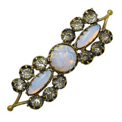 Broche europeo vintage de cristal dorado de diseño