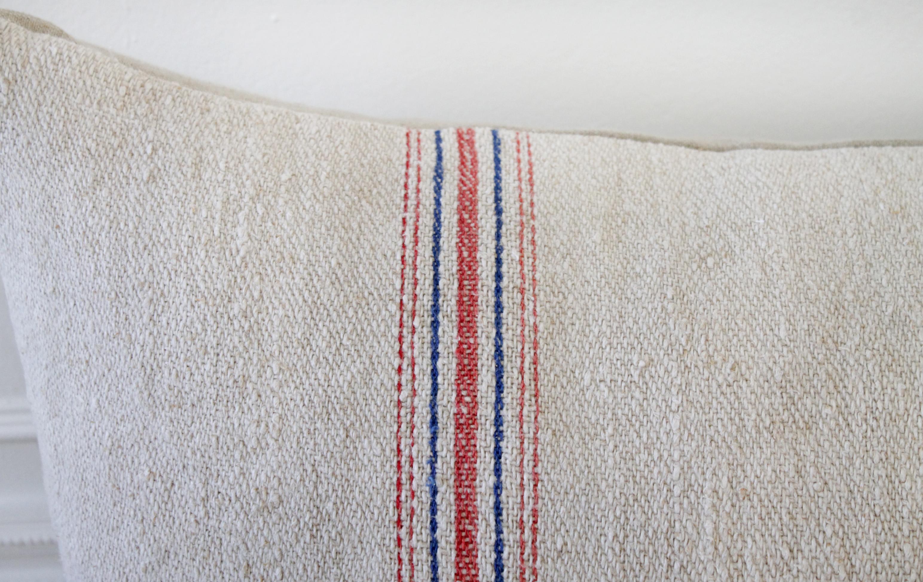 Vintage European grain sack pillows, custom made with a patchwork design. Oatmeal colored background, with red/blue stripes, and hidden zipper closure. Some grain sacks have original patchwork, and stitching. Please see photos. Inserts not