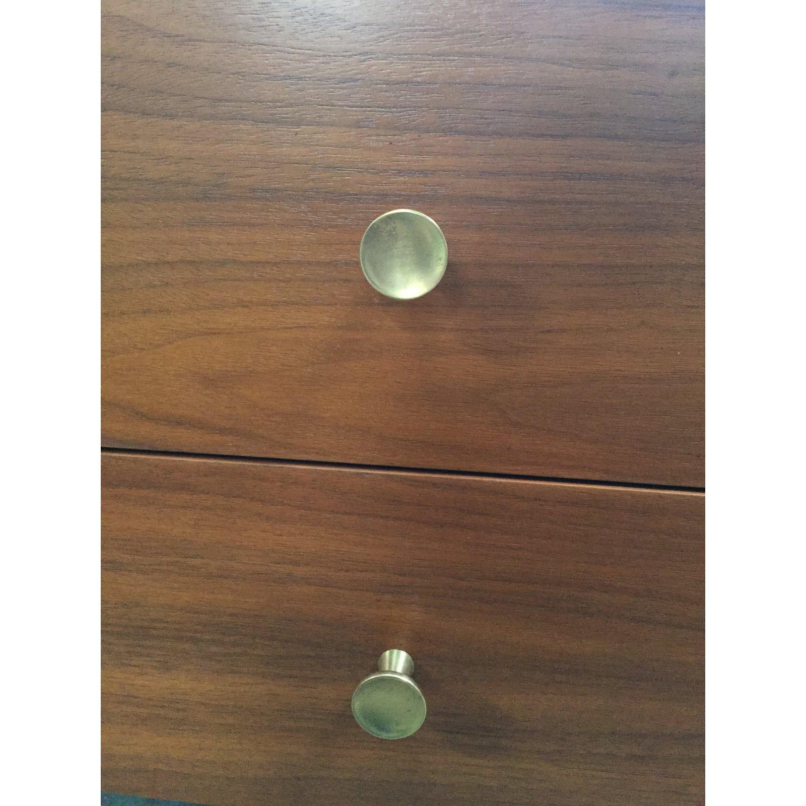 Beautiful midcentury nightstands. Featuring tapered legs and golden knobs.
