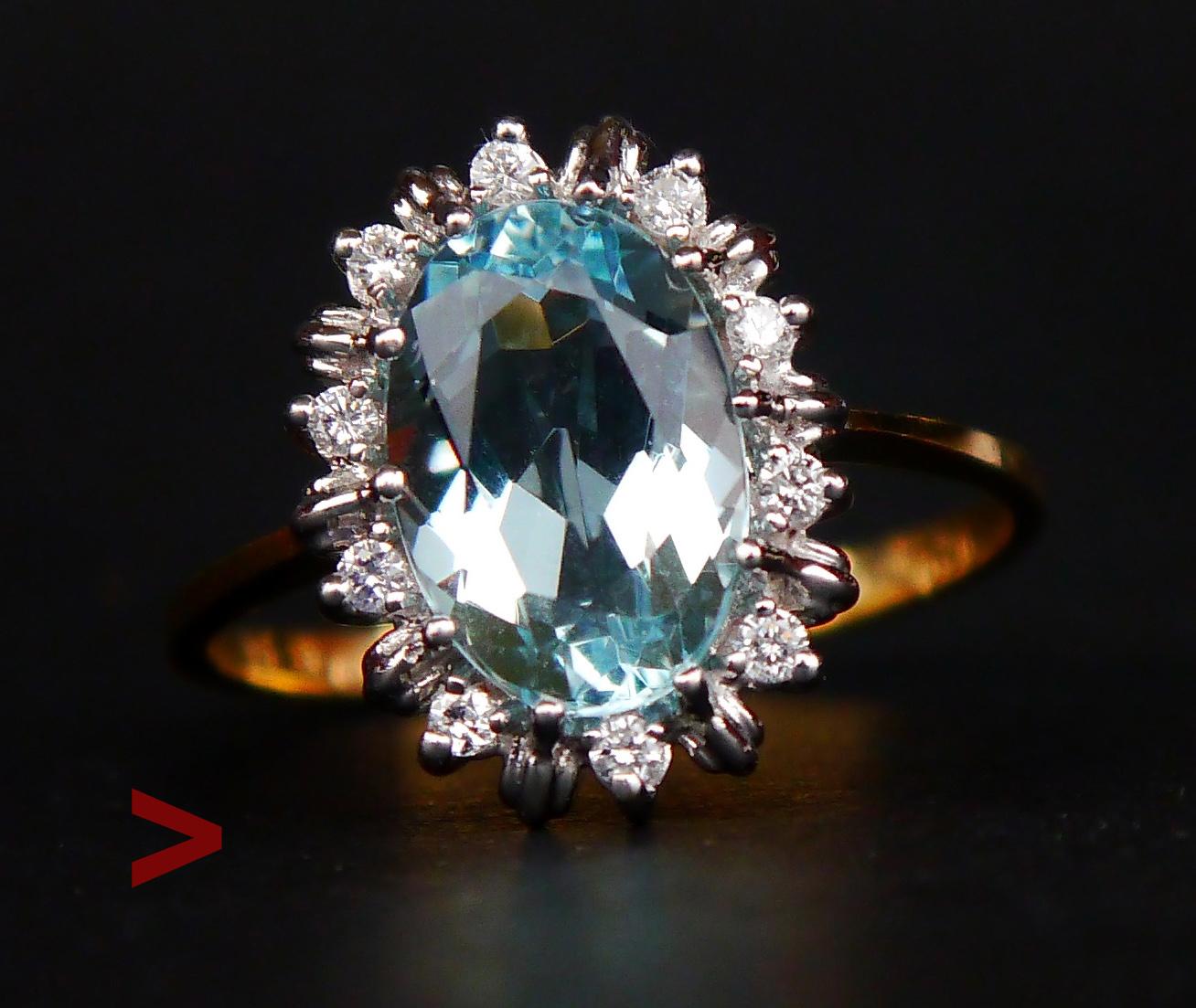 Vintage Aquamarine and Diamonds Ring ,made ca. 1960-1970s.

The band in solid 18ct Gold with top of the crown 16 mm x 12 x 7 mm deep in white Gold or Platinum featuring natural transparent Aquamarine stone 12 mm x 8 mm x 5mm / ca.3 ct ct of