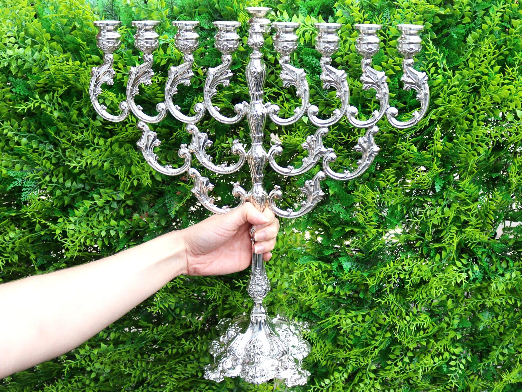 An exceptional, fine and impressive vintage European sterling silver Hanukkiah; an addition to our ornamental silverware collection

This exceptional vintage sterling silver hanukkiah* has circular rounded capitals onto a baluster-shaped column