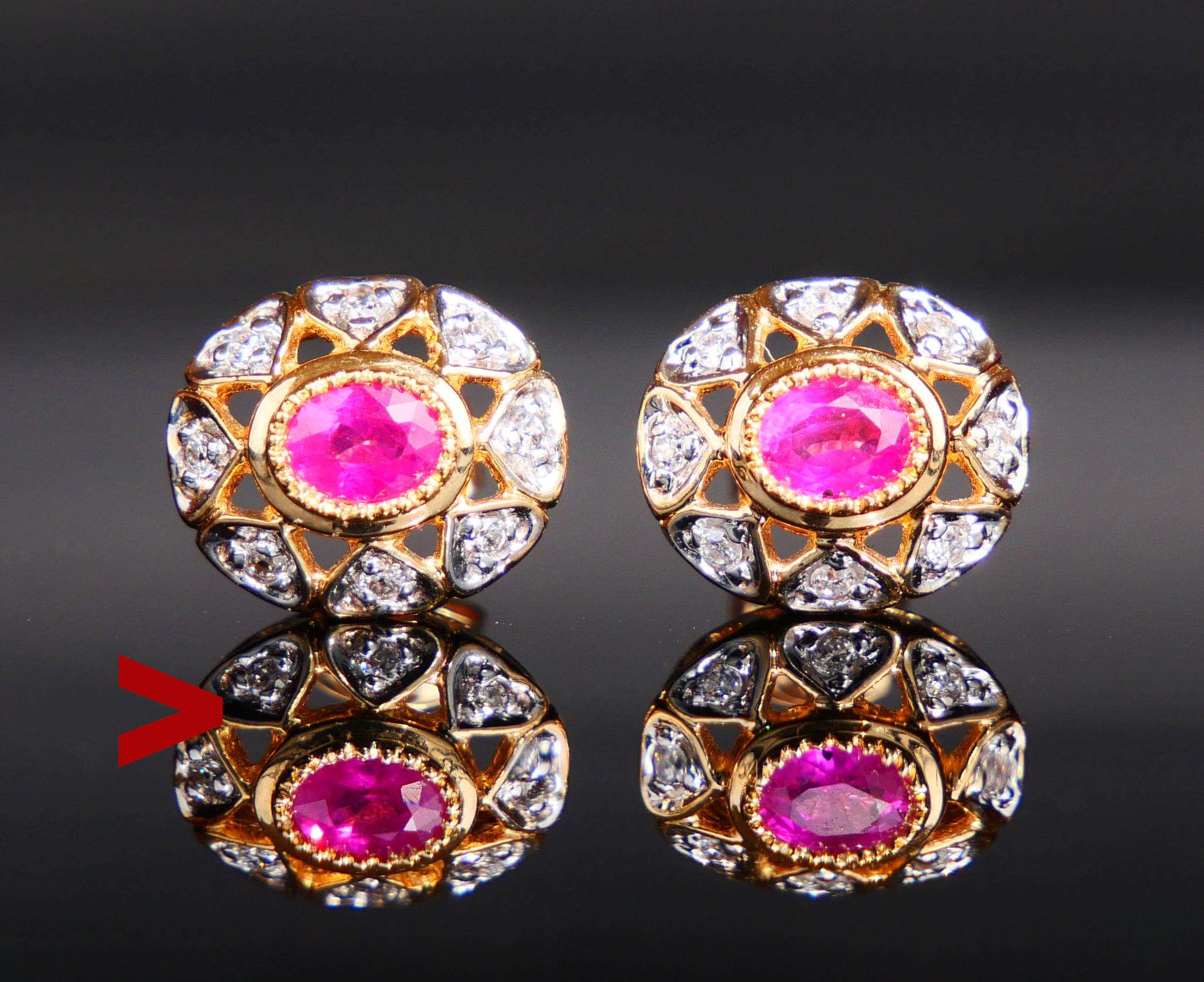 A pair of fine openwork flower halo studs in solid 18K Yellow and White Gold.

European, made ca. 1960s -1970s.

Two bezel set oval cut natural rosy Red Rubies 4 x 3 mm / ca. 03 ct each, both demonstrate flaws and inclusions typical for