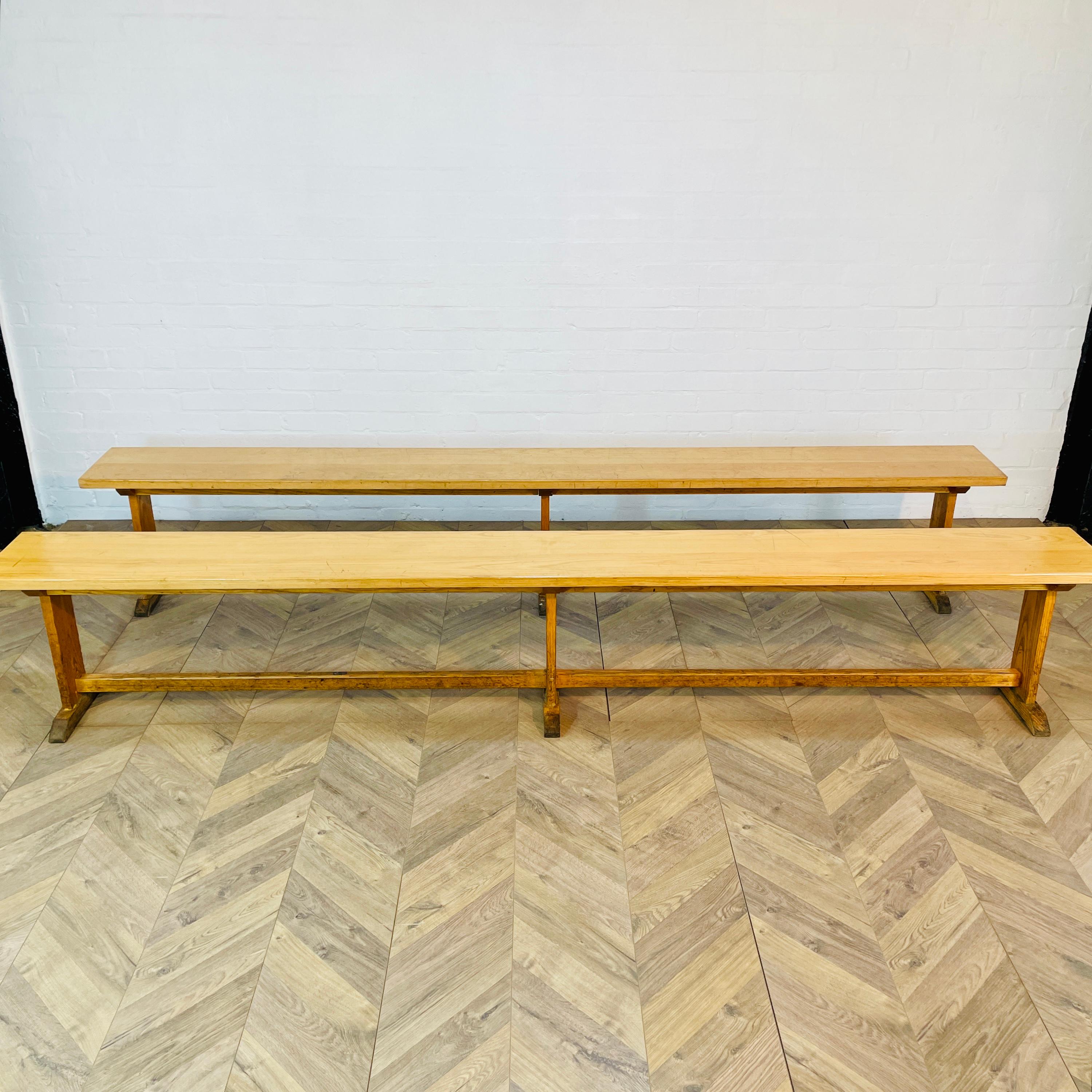 A Lovely Pair of Oak School Benches, circa 1950s.

The benches came out of a Cambridge private school; The Leys.

The benches are good vintage condition but in-keeping with their age and usage do show signs of wear but remain structurally strong.
