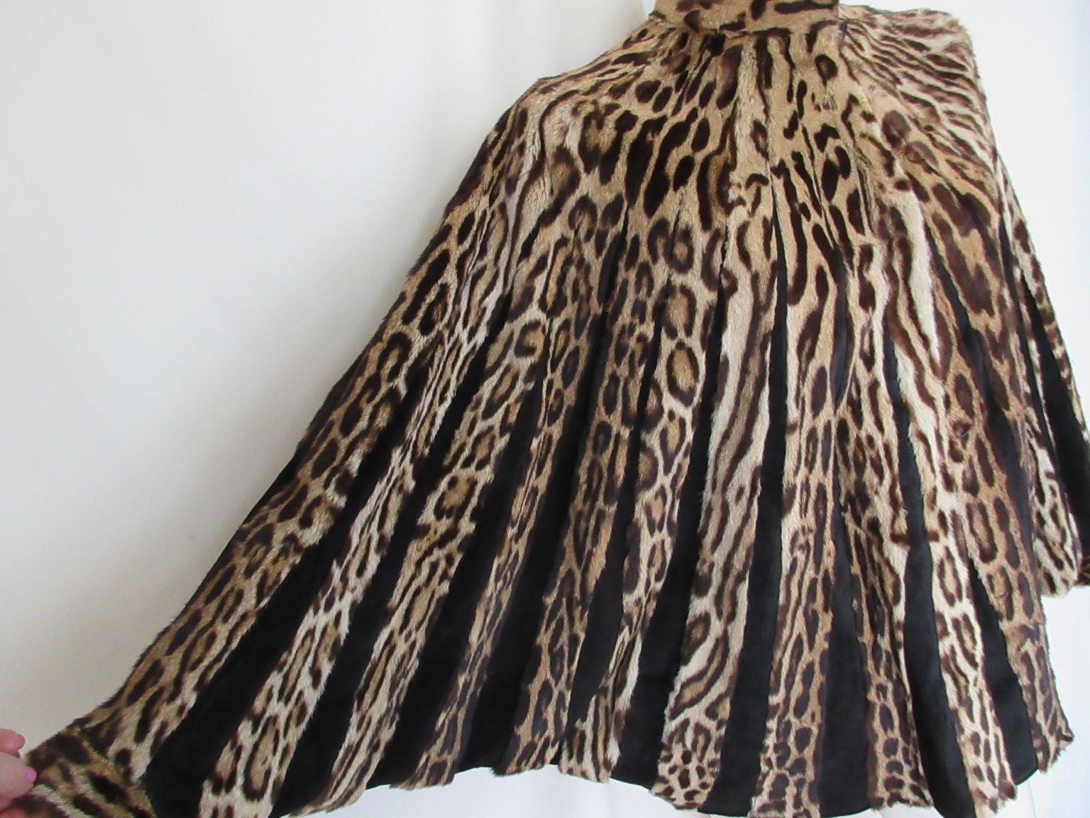 Rare vintage printed ocelot fur jacket 1940's

We offer more luxurious fur coats, view our frontstore

Details:
2 pockets, 1 closing hook at collar
wide sleeves
narrow end at sleeves
3 closing hooks
Black Leather panels
Fully lined
Made circa