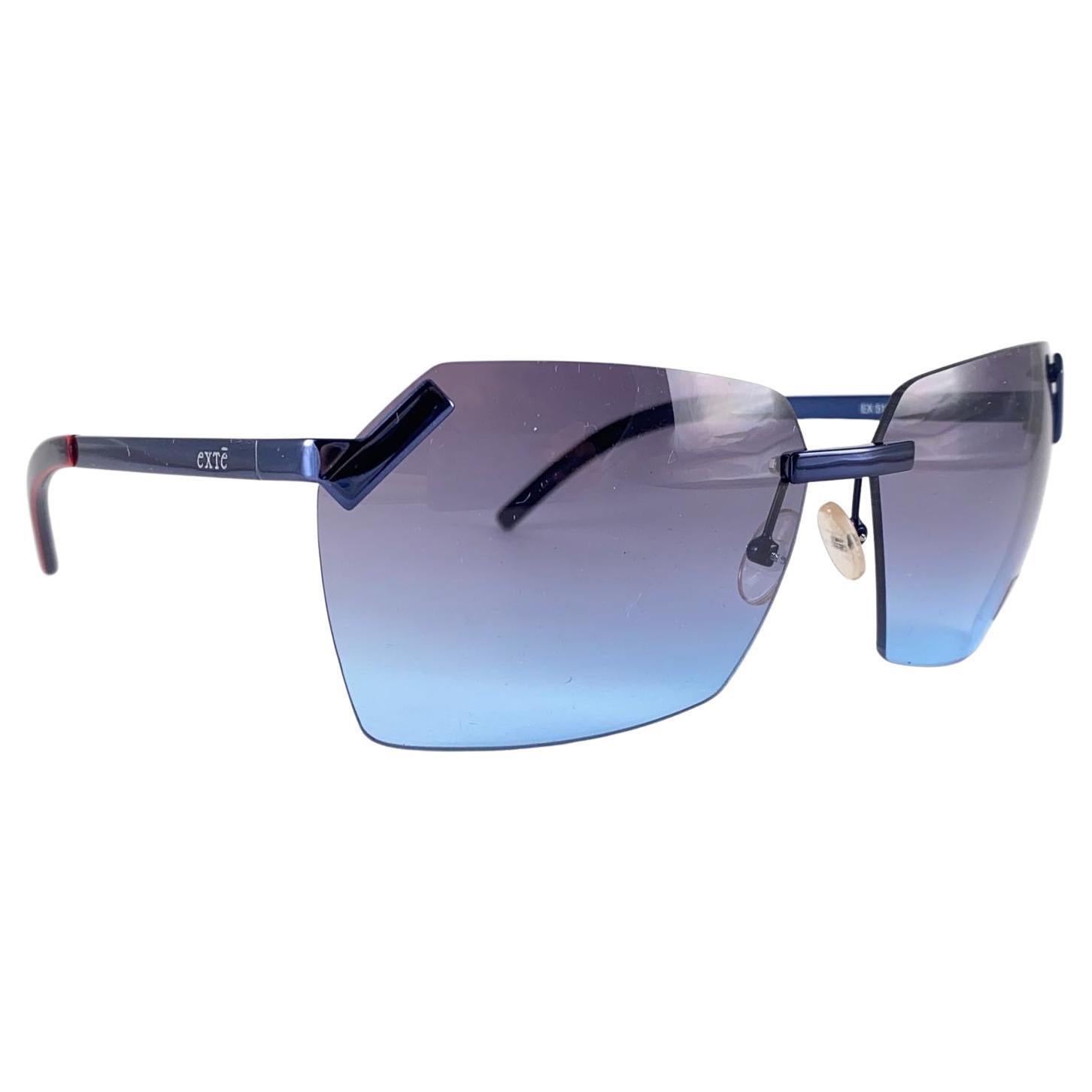 Vintage Exte EX 512 Rimless Sunglasses 2001 Italy

Purple Gradient Lenses.

This item may show minor sign of wear due to storage.



Front : 13 cms

Lens Height : 4.6 cms

Lens Width : 5.8 cms 

