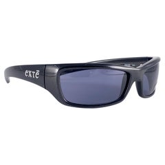 Vintage Exte EX2 Elegante schwarze Vintage-Sonnenbrille mit Wickelumrandung 2001 Italien