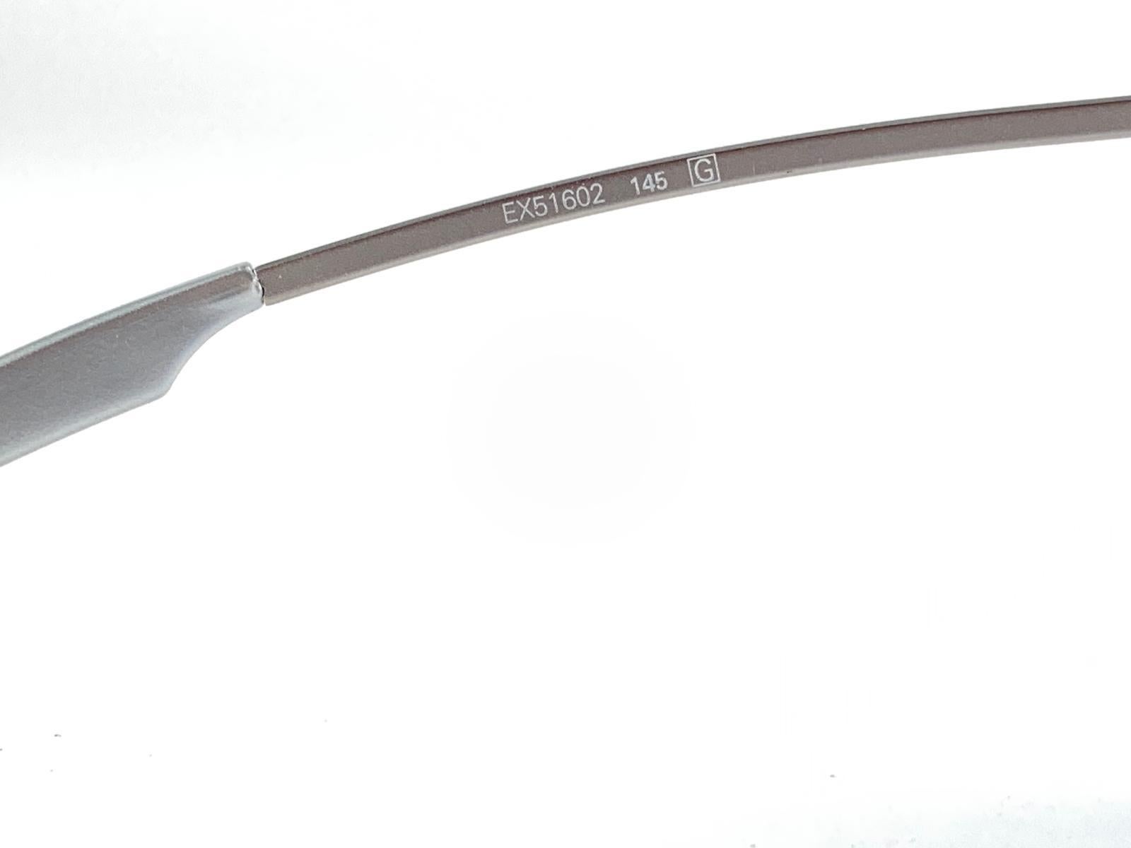 Vintage Exte EX5160 Gafas de sol envolventes plateadas 2001 Italia Plata en venta