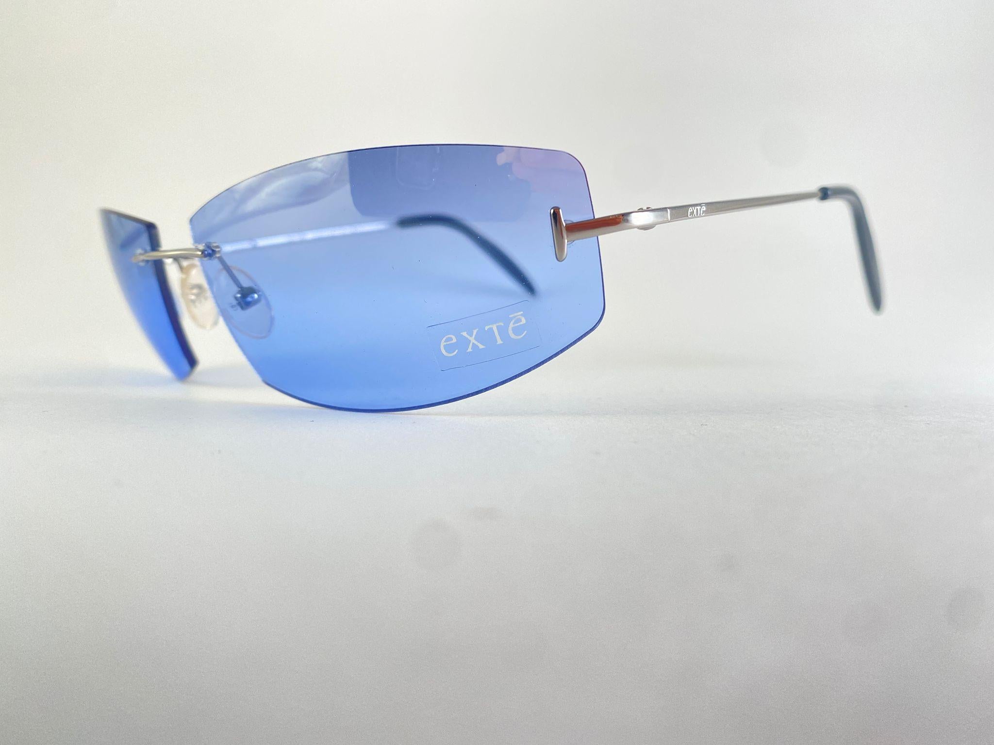 Lunettes de soleil vintage Exte bleu sans monture 2001 Italie Unisexe en vente