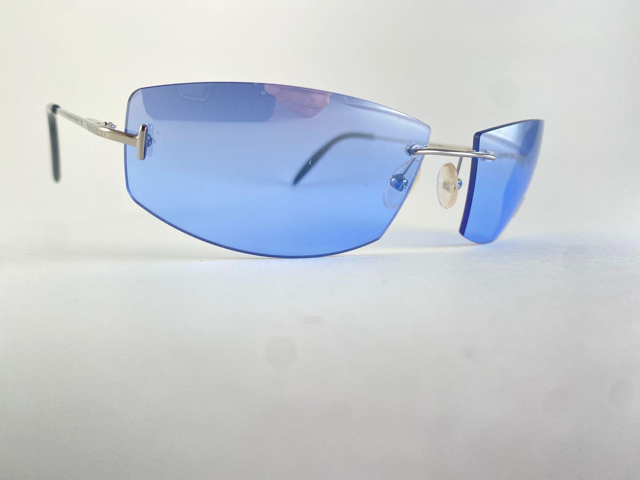 Lunettes de soleil vintage Exte bleu sans monture 2001 Italie en vente 2