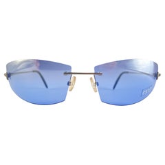 Lunettes de soleil vintage Exte bleu sans monture 2001 Italie