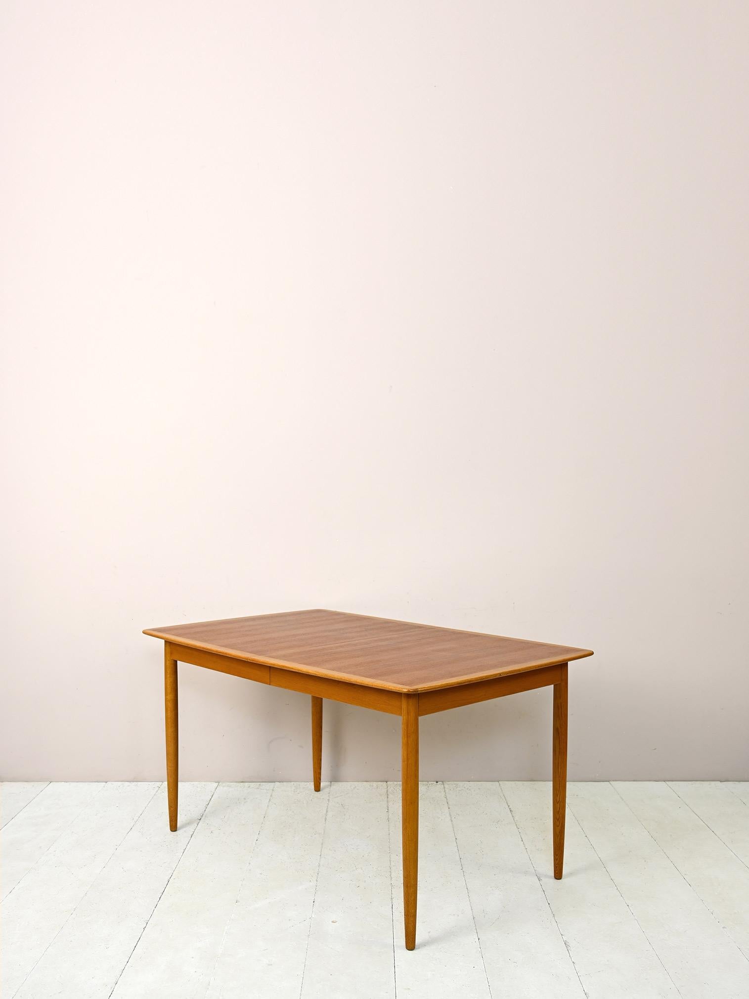Scandinavian Vintage Extendable Teak and Oak Table For Sale