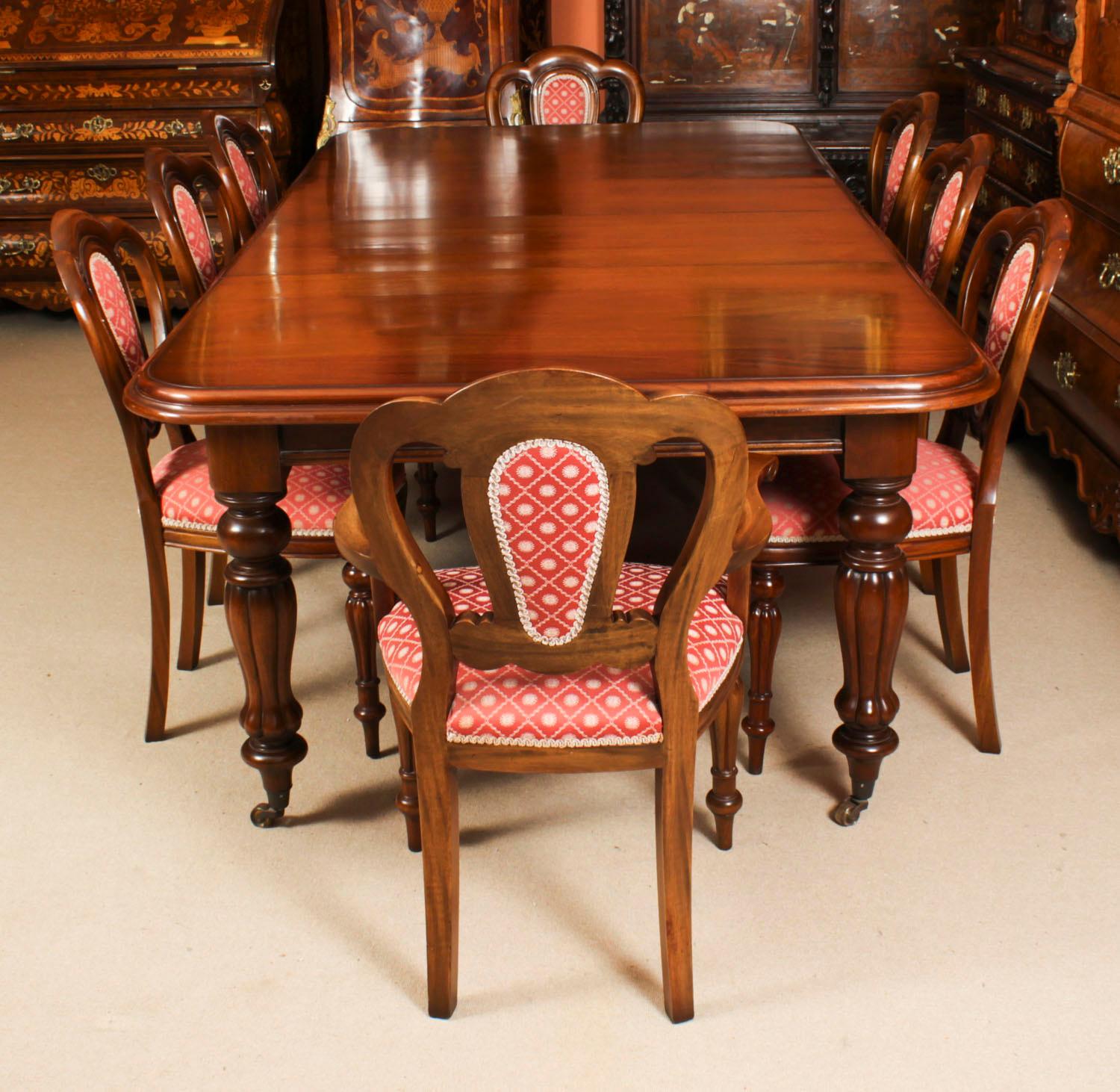 This is a fabulous vintage Victorian Revival mahogany extending dining table and the matching set of eight Admiralty Back dining chairs, dating from the late 20th Century.

The table has two original leaves and can comfortably seat eight. It has