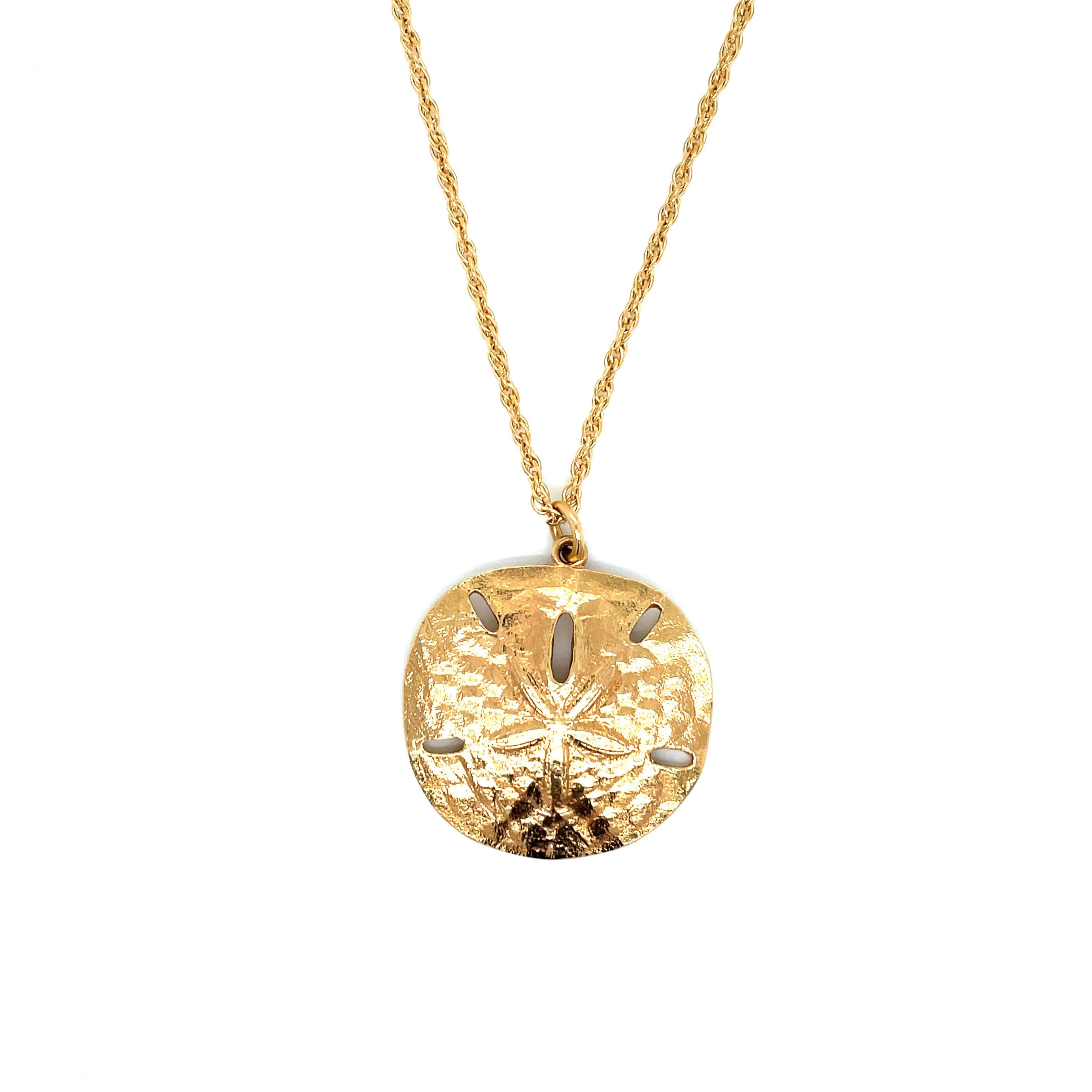 Vintage Extra Large Sand Dollar Charm Pendant with Chain:

Pendant:
Design: Beautifully detailed sand dollar charm
Size: 1 3/8