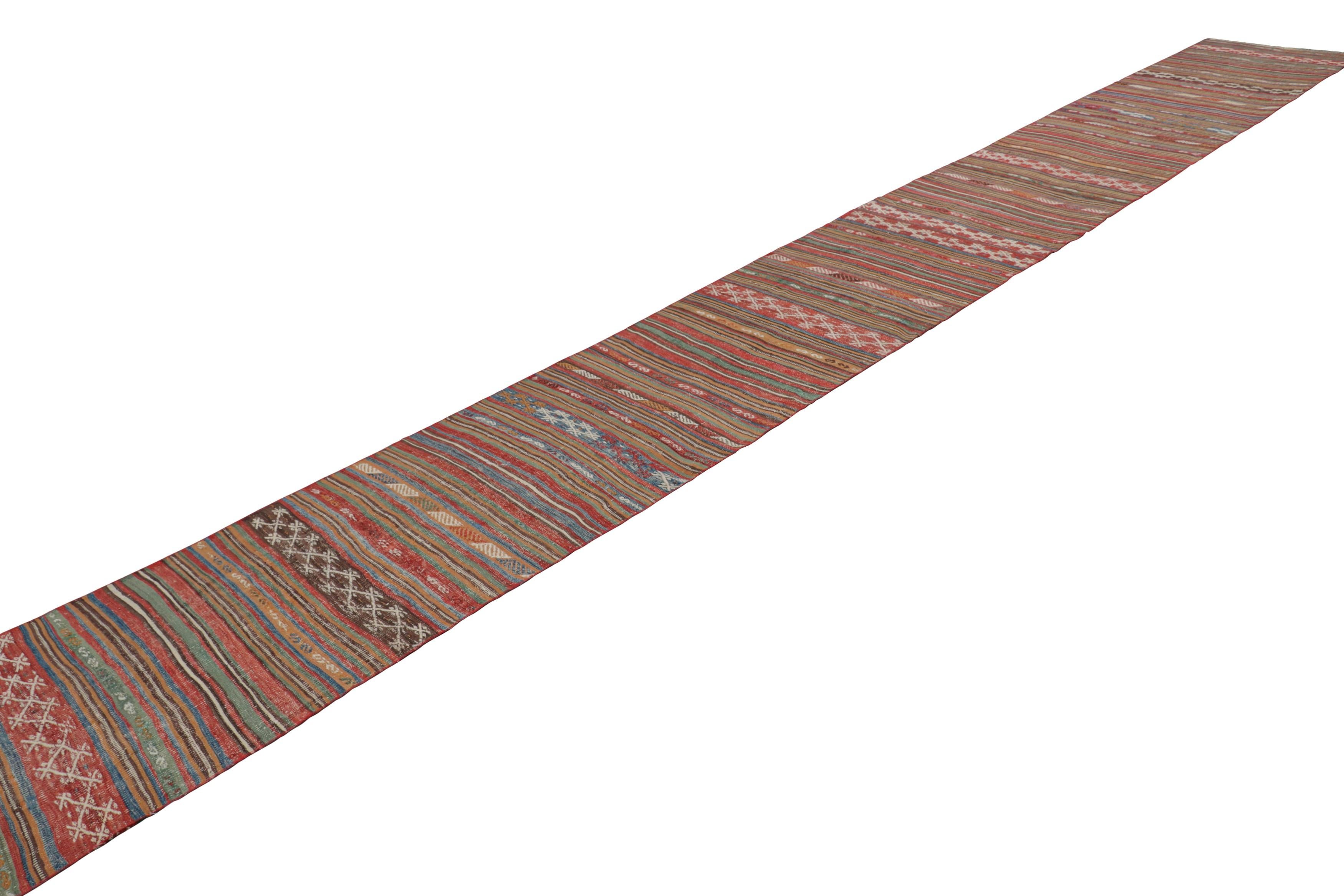 Vintage Extra-Long Kilim Runner Rug with Stripes and Tribal Motifs  Rug & Kilim In Good Condition For Sale In Long Island City, NY