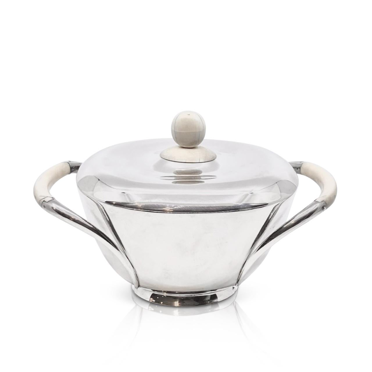 Sterling silver Mid-Century tureen with ivory handles and finial, design Svend Weihrauch from the 1940s. Elegant Mid-Century design, F. Hingelberg was one of the premier silvers makers in Denmark at the time, their hand craftsmanship is of the