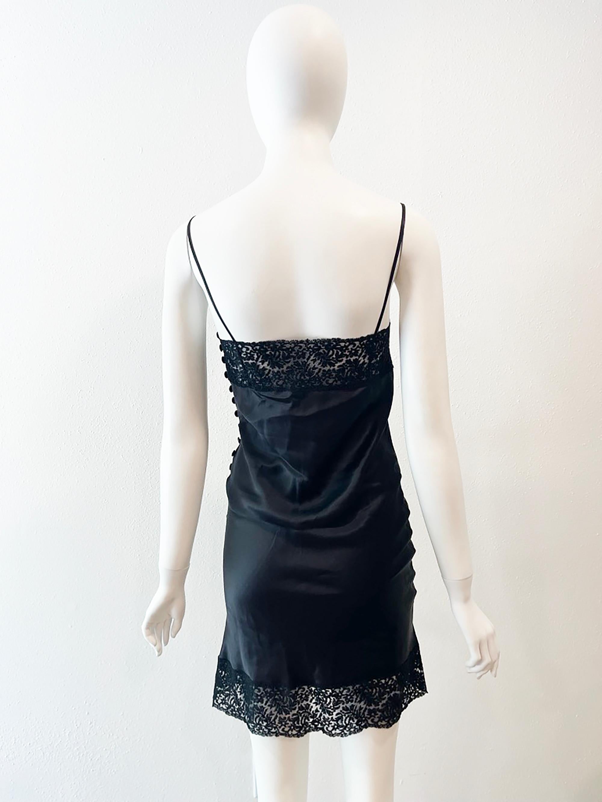 Vintage F/W 1997 Christian Dior by John Galliano Black Lace Satin Mini Dress
DESIGNER: F/W 1997 Christian Dior by John Galliano- CONDITION: Good- Flawless!- FABRIC: 100% silk- COUNTRY MADE: France- SIZE: 40

MEASUREMENTS; provided as a courtesy