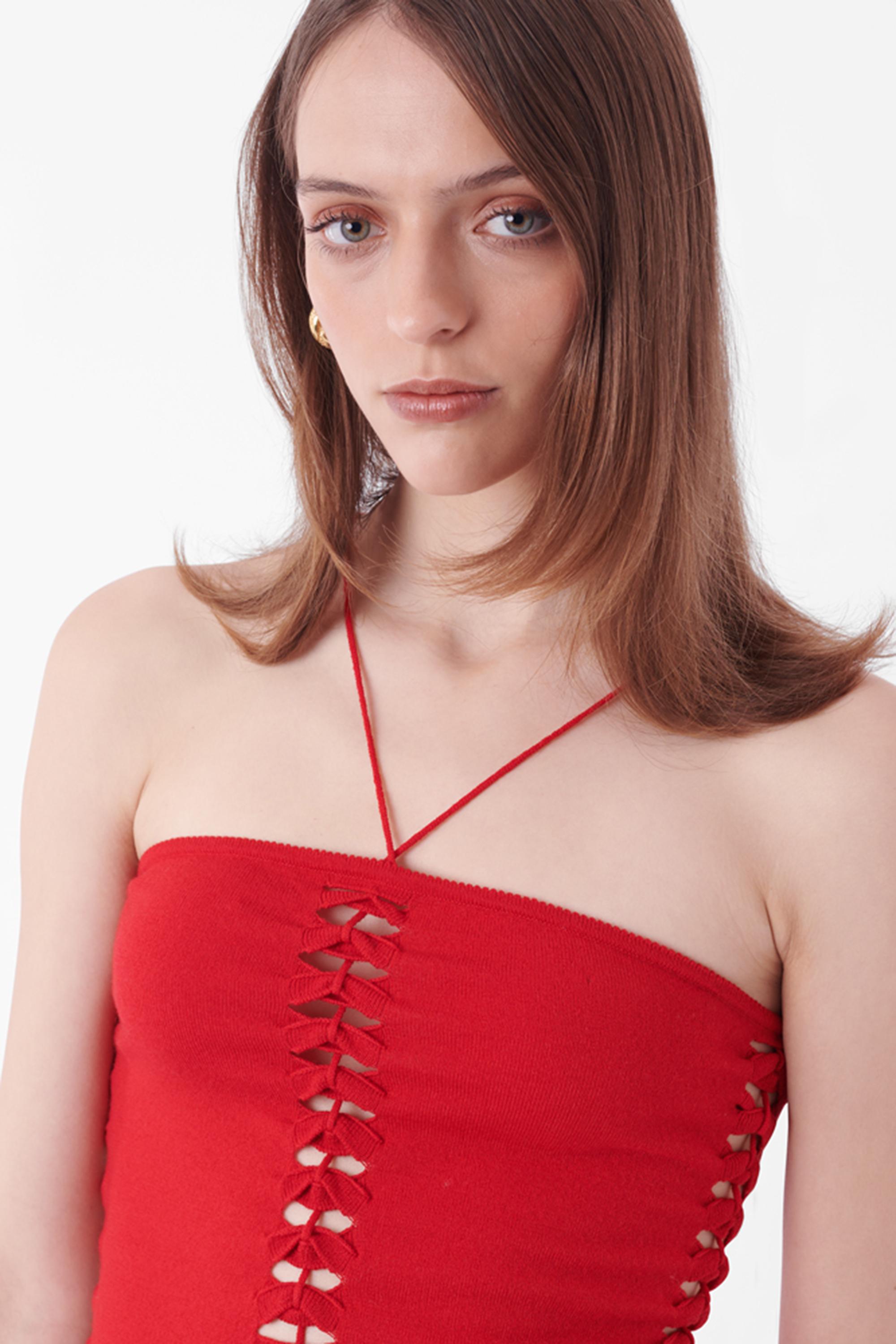 John Galliano Fall Winter 2001 knit dress. Features halter neck string, open cut out side panel and chest detailing and stretch knit fabric. In excellent vintage condition.
Brand: John Galliano
Size: UK 8
Color: Red
Label size: M
Modern size: UK 8