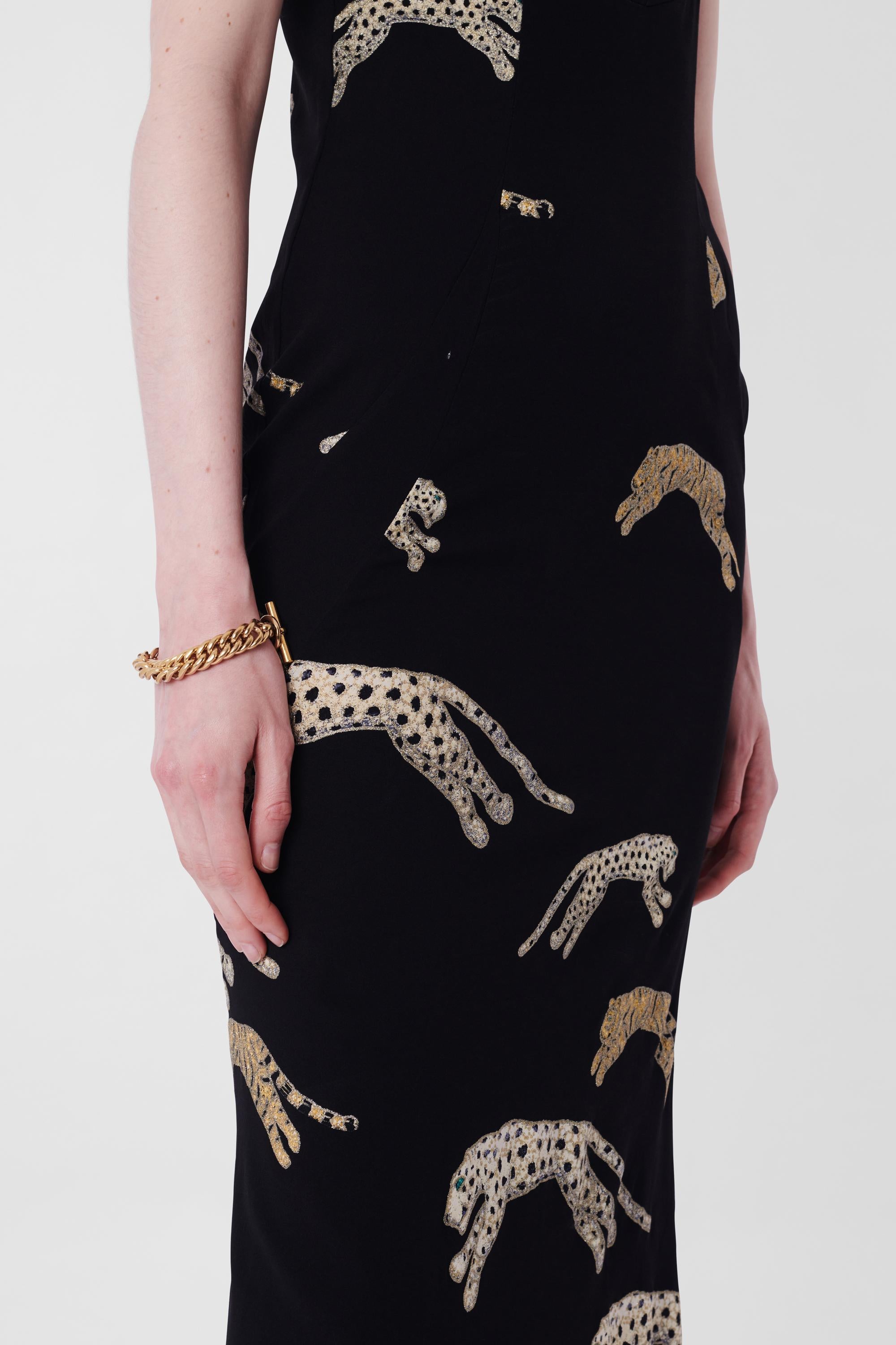 Roberto Cavalli F/W 2002 Cheetah Print Bodycon Maxi Dress. Features metallic cheetah print, spaghetti straps and mermaid hem. In excellent vintage condition.
Brand: Roberto Cavalli
Size: UK 8
Color: Multi
Label size: Small
Modern size: UK: 8 to 10,