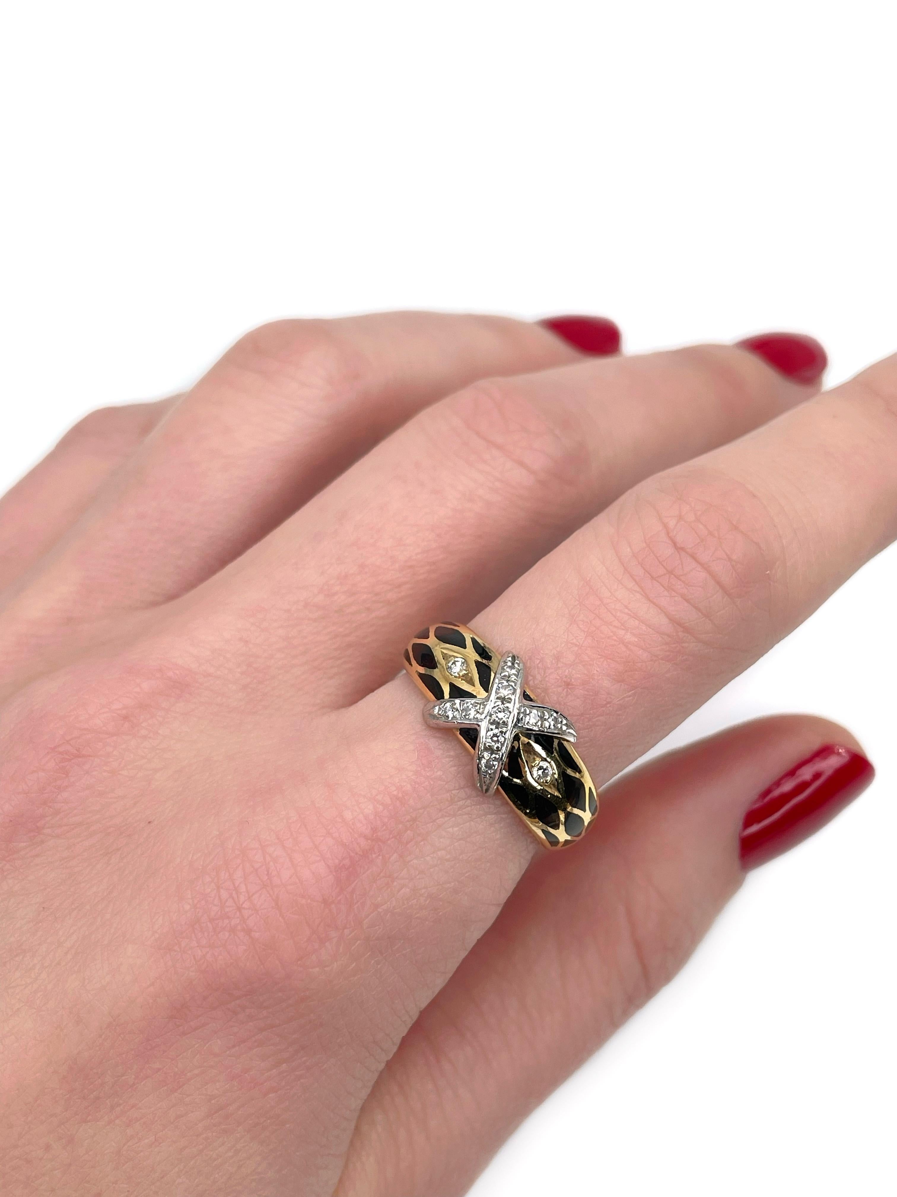 This is a vintage band ring designed by Victor Mayer for Faberge. It is crafted in 18K yellow gold. Circa 2000. 

The piece features round brilliant cut diamonds. It is adorned with dark brown and black enamel. 

Signed with “Faberge, 18Kt, Germany”