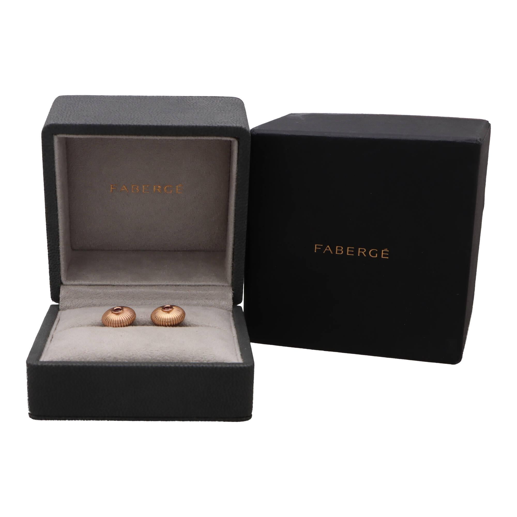 A unique pair of vintage Faberge ‘Colours of Love’ fluted round bar cufflinks set in 18k rose gold.

From the current Colours of Love collection, each cufflink is composed of a round fluted motif, set to the centre with a round cut vibrant ruby