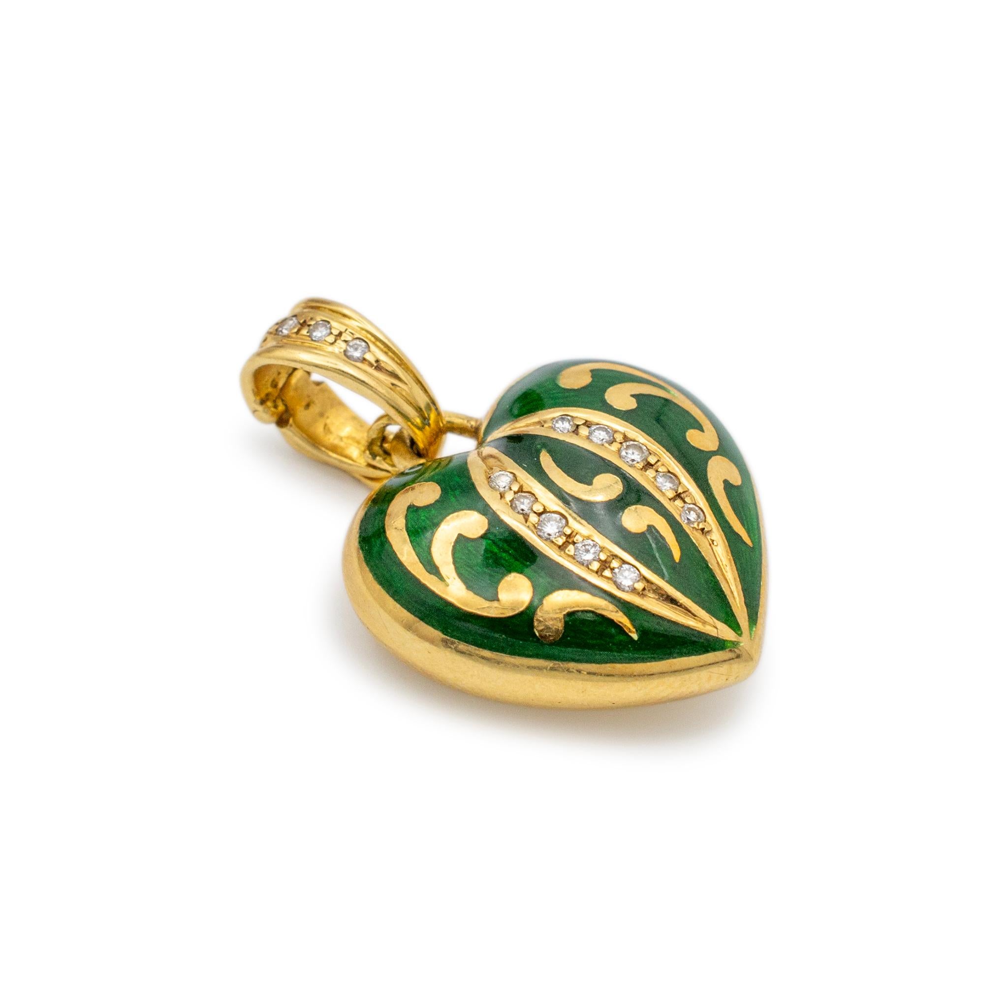 Brand: Faberge

Metal Type: 18K Yellow Gold

Thickness: 8.75 mm

Length: 1.00 inches

Width: 0.75 inches

Weight: 9.09 grams

18K yellow gold symbol diamond vintage heart-shaped pendant. The metal was tested and determined to be 18K yellow gold.