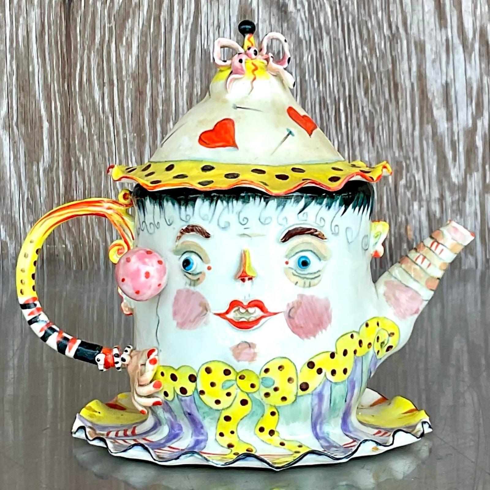 teapot with face