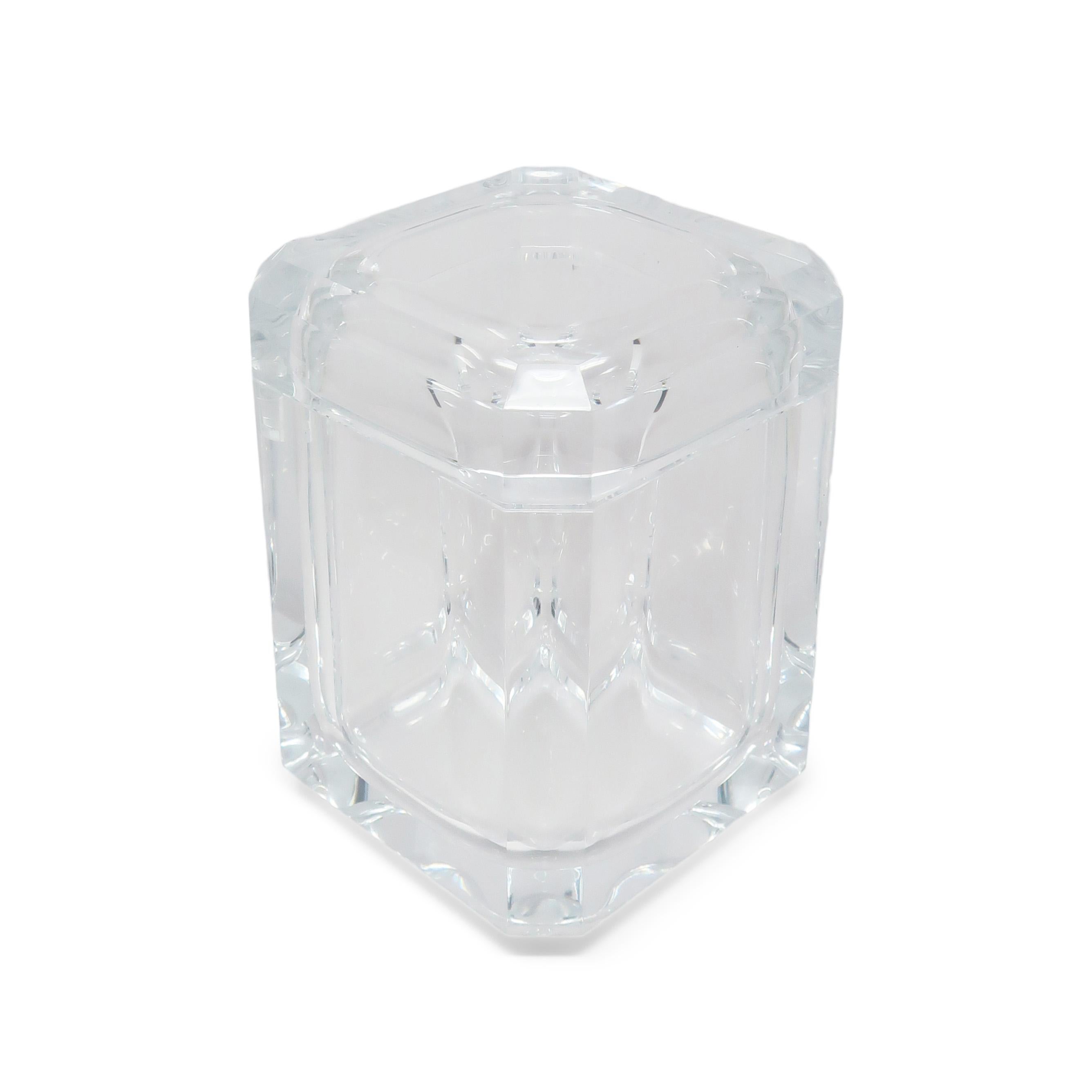 A stunning 1970s lucite ice bucket in the style of Alessandro Albrizzi.  It has a swivel lid to expose the ice storage within and wonderfully faceted edges that catch light beautifully. 

In very good vintage condition with wear consistent with age