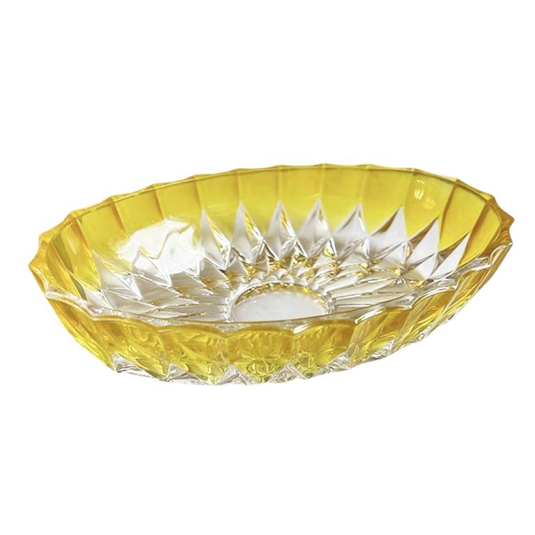 A striking Mid-century faceted candy dish by Walther Glass. This piece is oval in shape and features a diamond-textured pattern on the exterior. The interior of the bowl is smooth. The entire piece is transparent, with a bright yellow color at the