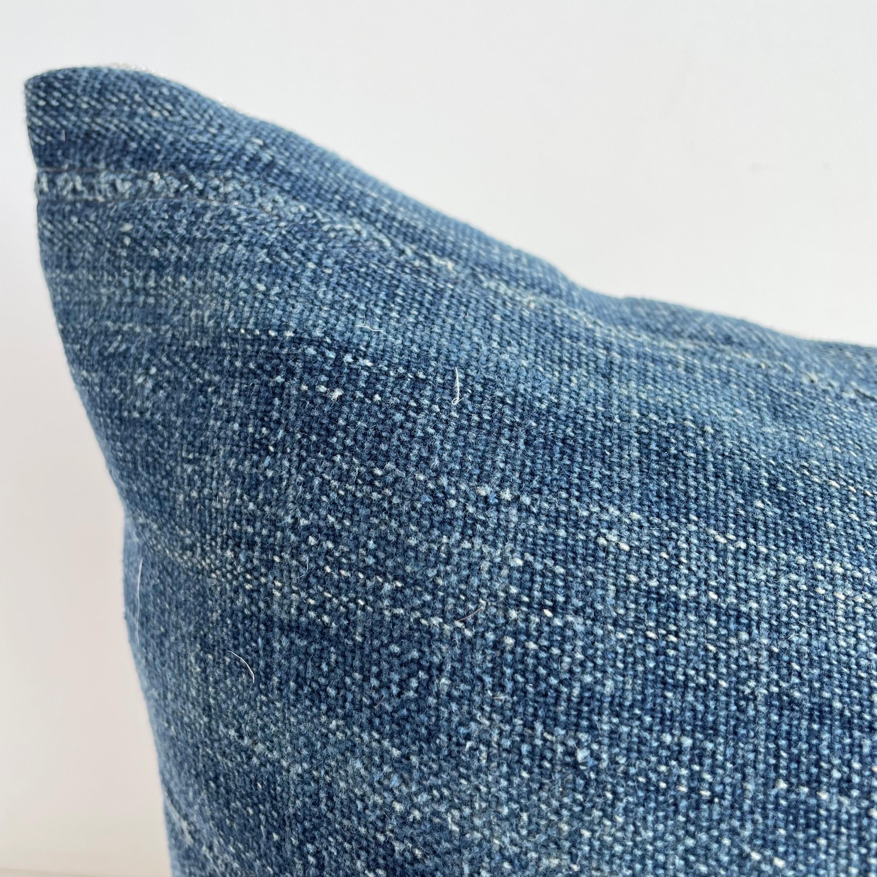 Antique faded blue indigo stripe African mudcloth pillows with original fringe details. Fabric: Vintage hemp fabric front, natural colored linen fabric back. Due to the nature of vintage textiles, there may be fading or markings. While they add to