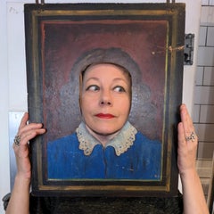 Vintage fairground male & female portraits with hinged faces & cut-out nose/eye