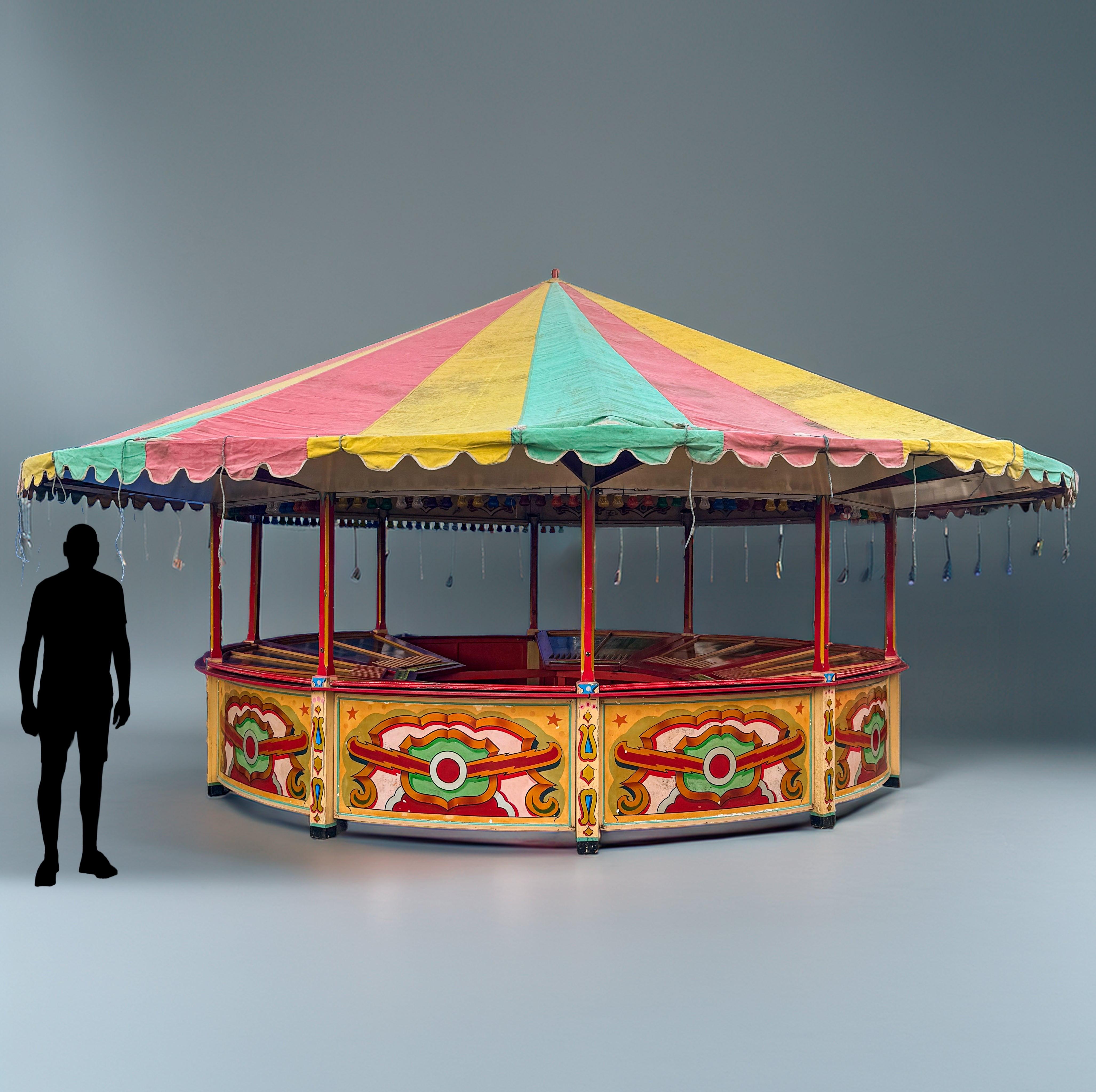 Step right up to a genuinely rare opportunity to purchase a vintage fairground stall with original game elements included. 

Bold, vibrant and packed full of nostalgia, this traditional British fairground attraction is the classic game Roll-a-ball