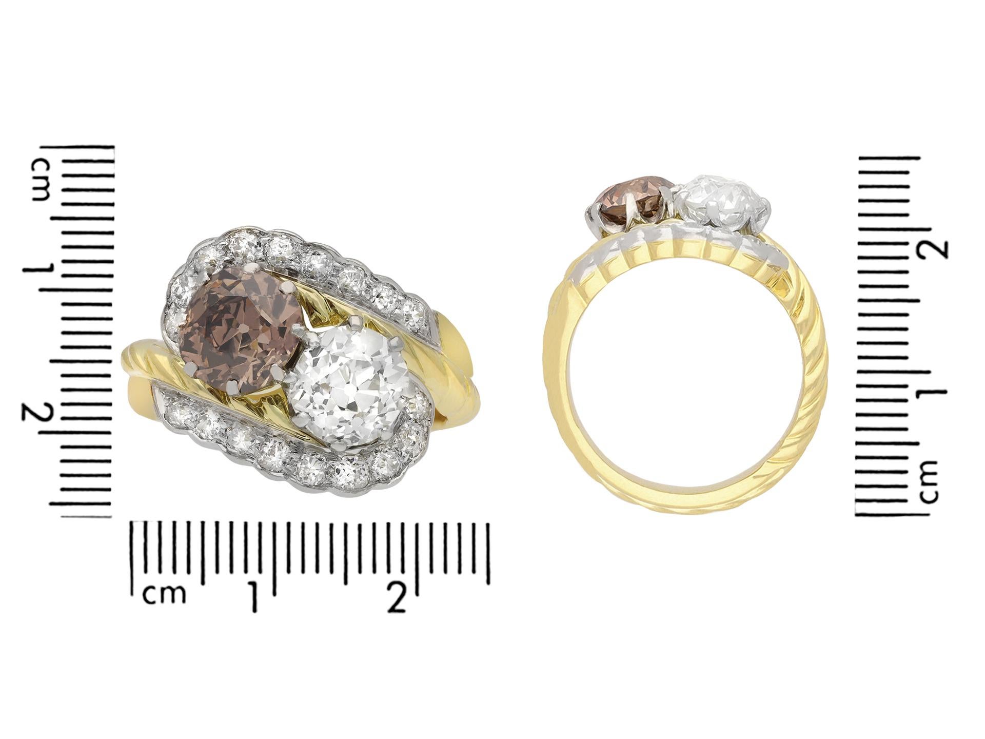 Old European Cut Vintage fancy coloured diamond crossover ring, circa 1950. For Sale