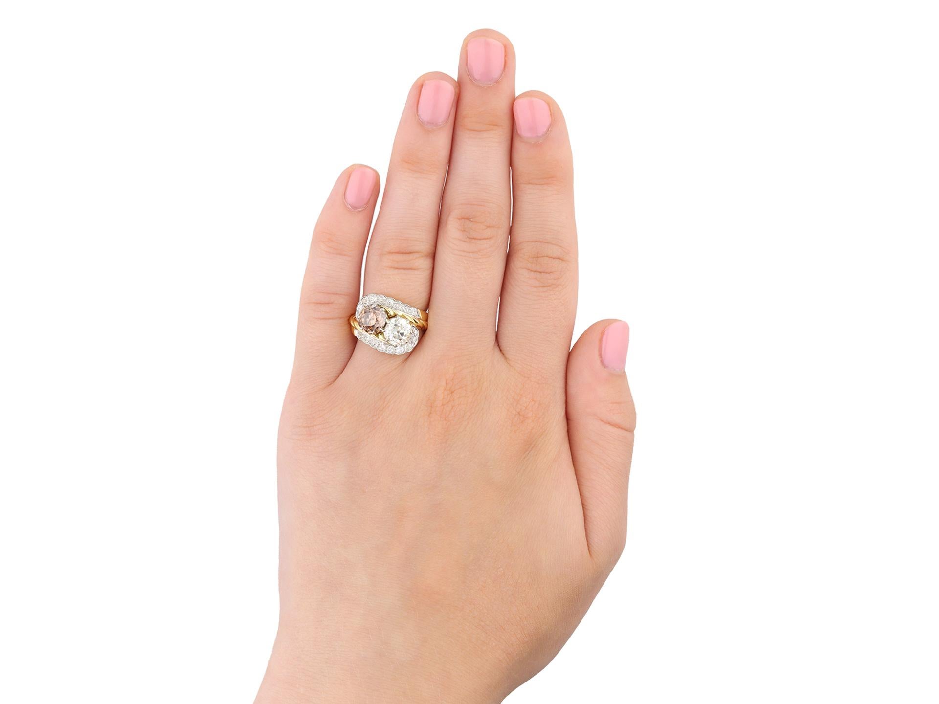 Vintage fancy coloured diamond crossover ring, circa 1950. In Good Condition For Sale In London, GB
