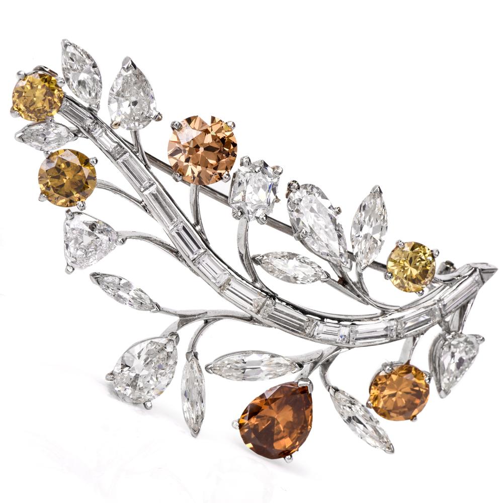 Featuring a Vintage leaf branch design crafted in solid platinum, accented with 8 genuine marquise cut Diamonds approx. 2.63 carats, H-I color, VS1-VS2 clarity, 4 genuine pear cut White Diamonds approx. 2.93 carats, H-I color, VS1-VS2 clarity, 12