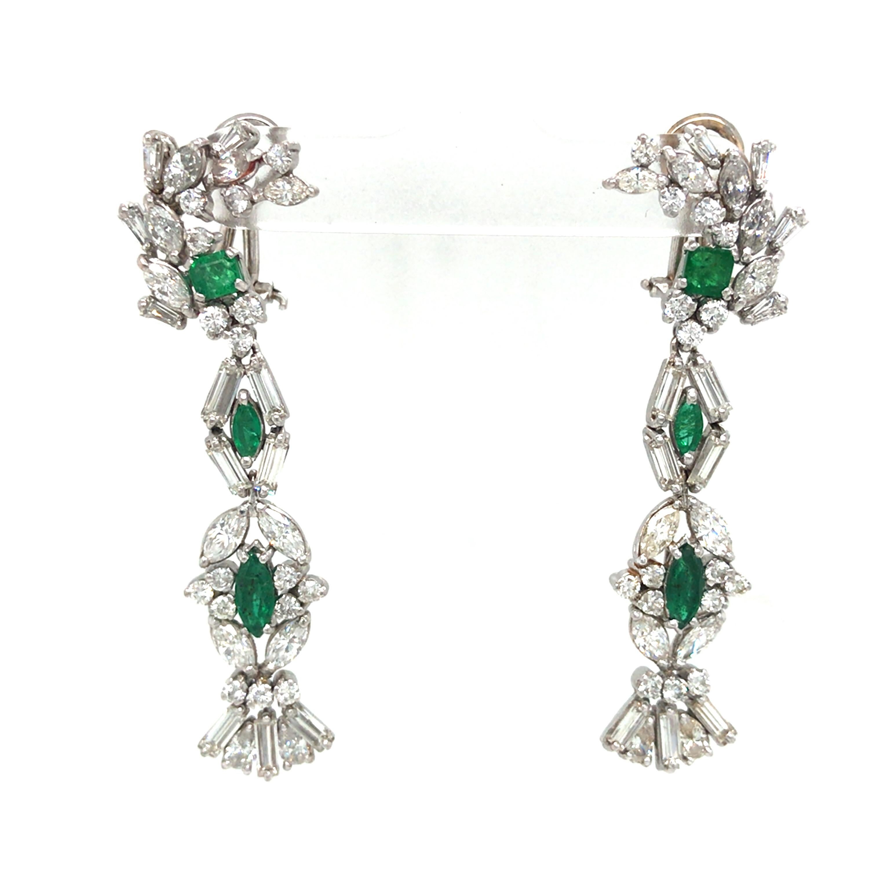 Vintage Fancy Shape Diamond and Green Emerald Diamond Hanging Earring in mix of 10k, 14k and 18k White Gold.  Marquise, Baguette, Round Brilliant Cut and Pear Shape Diamonds weighing 8.10 carat total weight, G-H in color, VS-SI in clarity and (6)