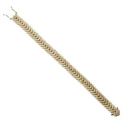 Vintage fancy yellow diamonds bracelet 18ct white gold
