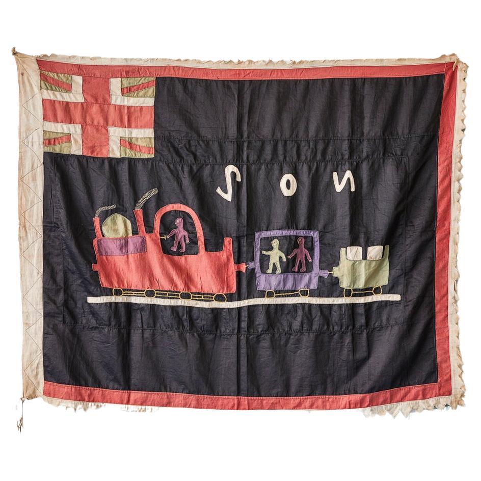 Ghana, 1930s-1950s 

Asafo flag “The train is always ready to go” in cotton applique patters. Trains were a dramatic expression of power, regularity and reliability and as such were a popular theme on Fante Asafo flags after the first railway was