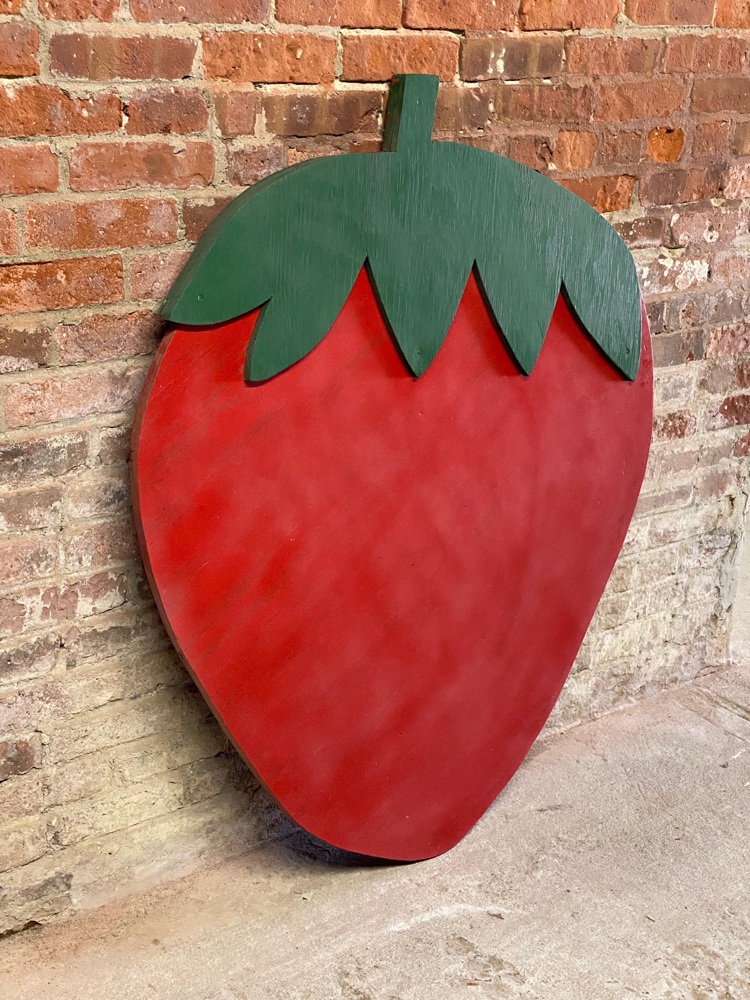 Bright red and green oversized plywood strawberry farm stand sign. The berry farmer had multiple acres in rural Rhinebeck, New York, Dutchess County. Oversized for greater visibility. Circa 1970-80. The gentleman farmer retired from his full time