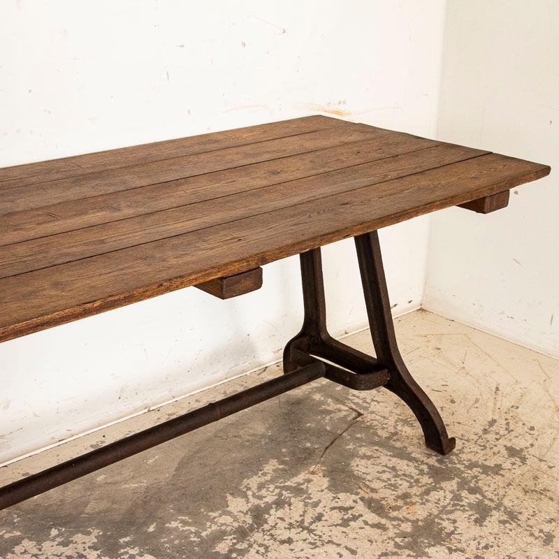 Vintage Farm Table Dining Table with Industrial Iron Legs and Stained Wood Top In Good Condition In Round Top, TX