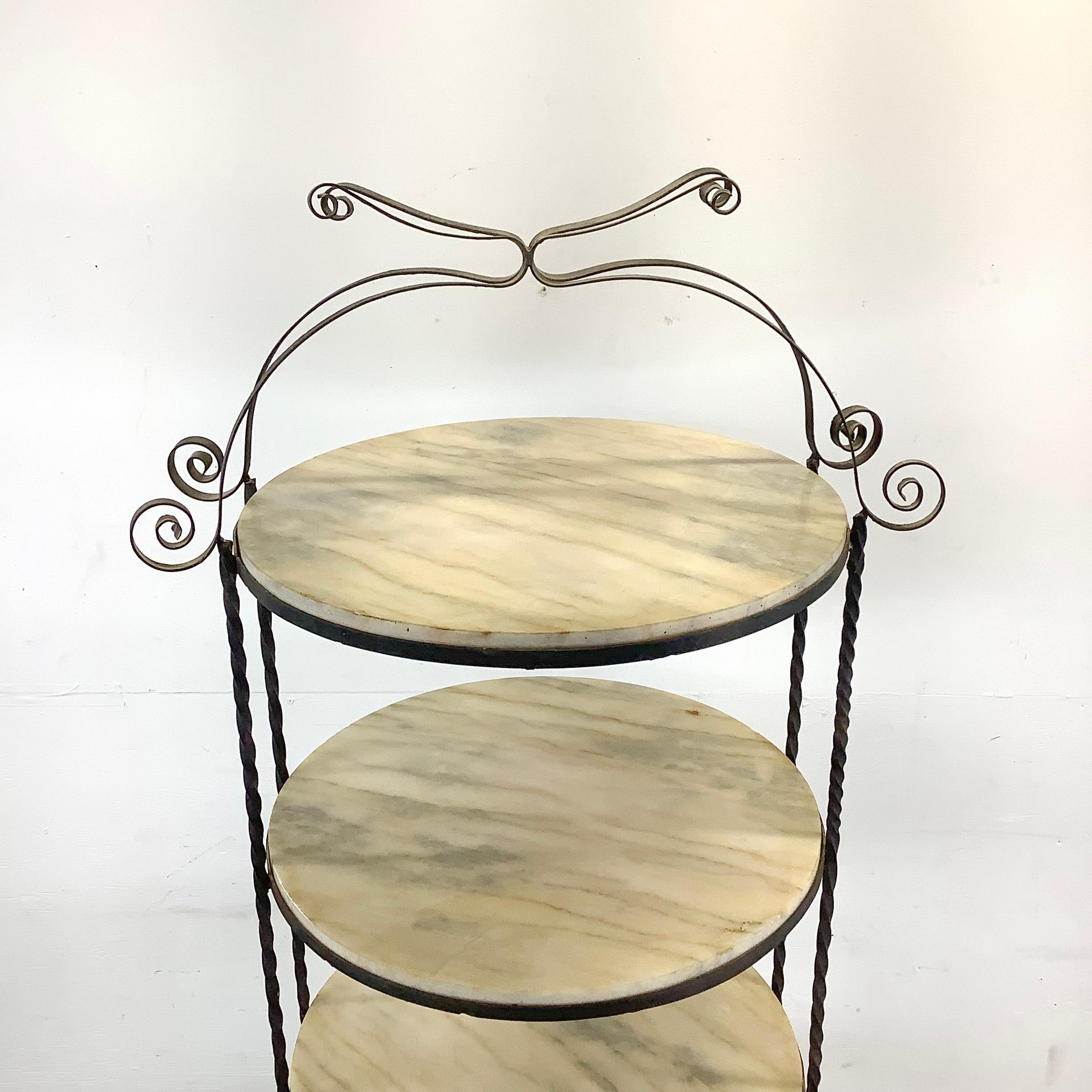 Introducing the Vintage Farmhouse Style Iron Frame and Marble Five Shelf Etagere – a timeless piece that seamlessly blends rustic charm with modern elegance. Crafted with meticulous attention to detail, this etagere embodies the essence of vintage