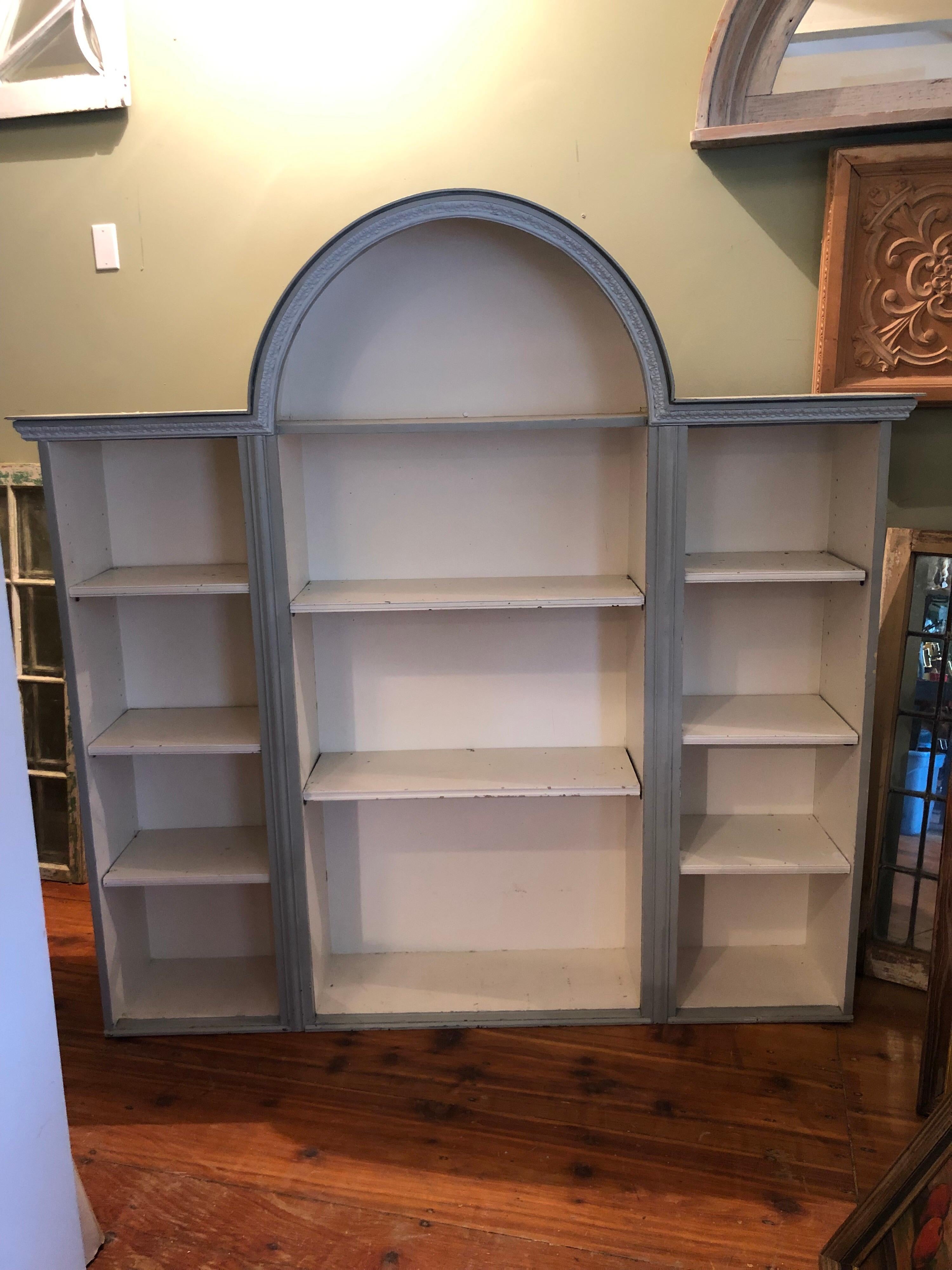  Vintage Farmhouse style bookcase. Shabby chic style with distressed painted finish. All shelves are adjustable for your desired heights and distance. Perfect for a child’s room. Painted in a pale gray blue with white shelves. Could also be hung on