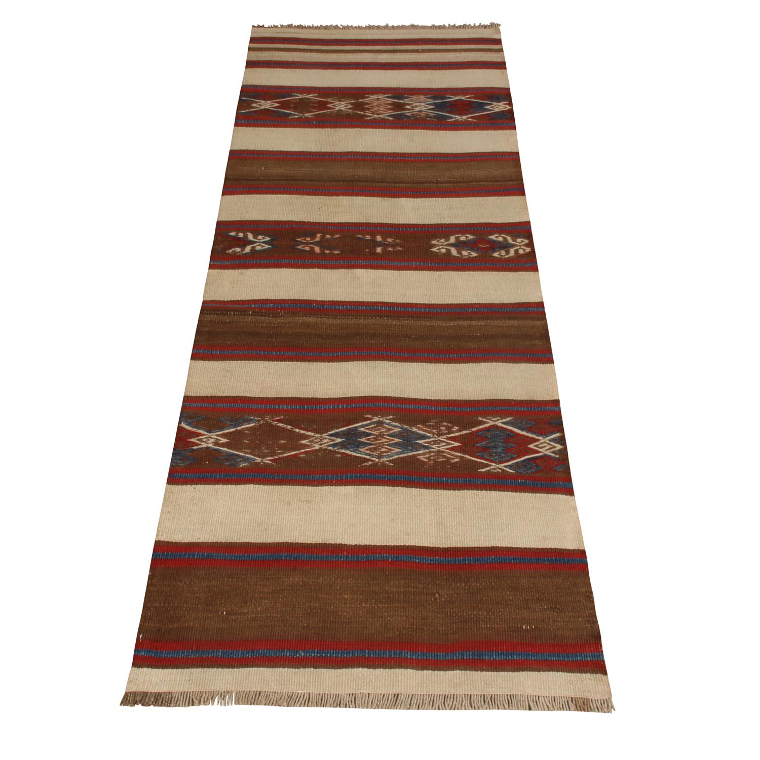 Flat-woven in high-quality wool with naturally dyed yarn originating from Turkey between 1940-1950, this vintage Sivas Kilim runner marries traditionalism and individualism in its approach to color, tastefully balancing the deep Vermillion