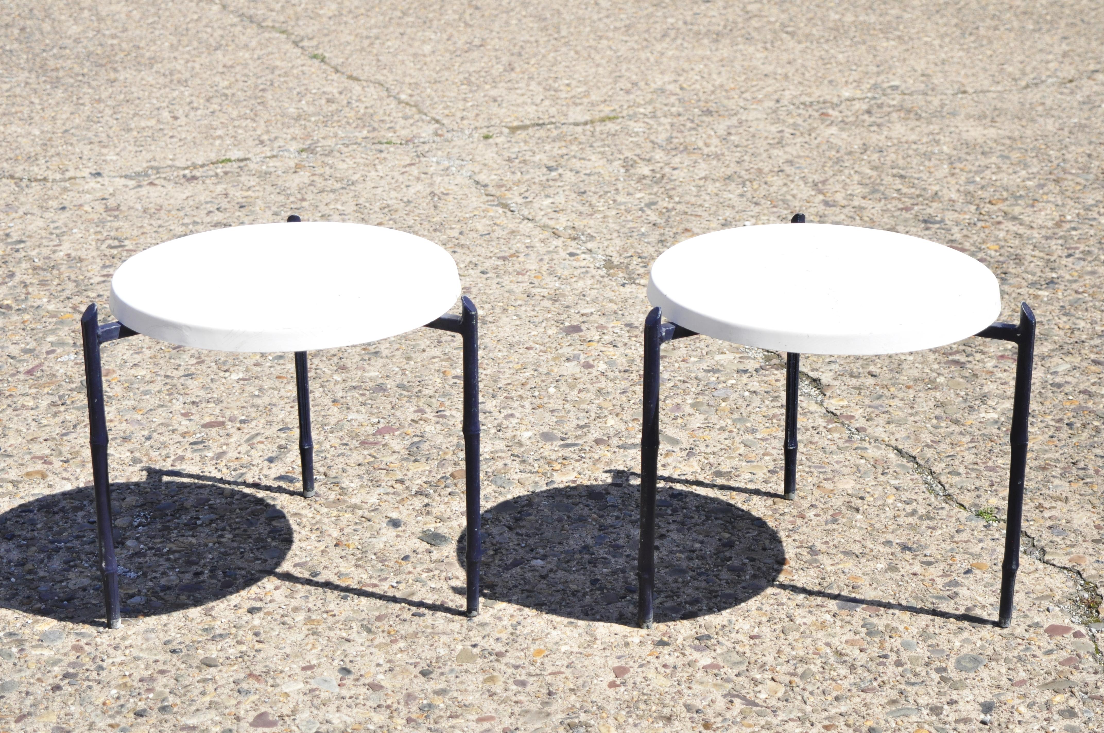 Vintage Faux Bamboo Aluminum Pool Patio Side Tables with Fiberglass Tops - a Pair. Item features a round fiberglass tops, cast aluminum faux bamboo design tripod bases, very nice vintage pair, great style and form. Circa Mid to Late 20th Century.