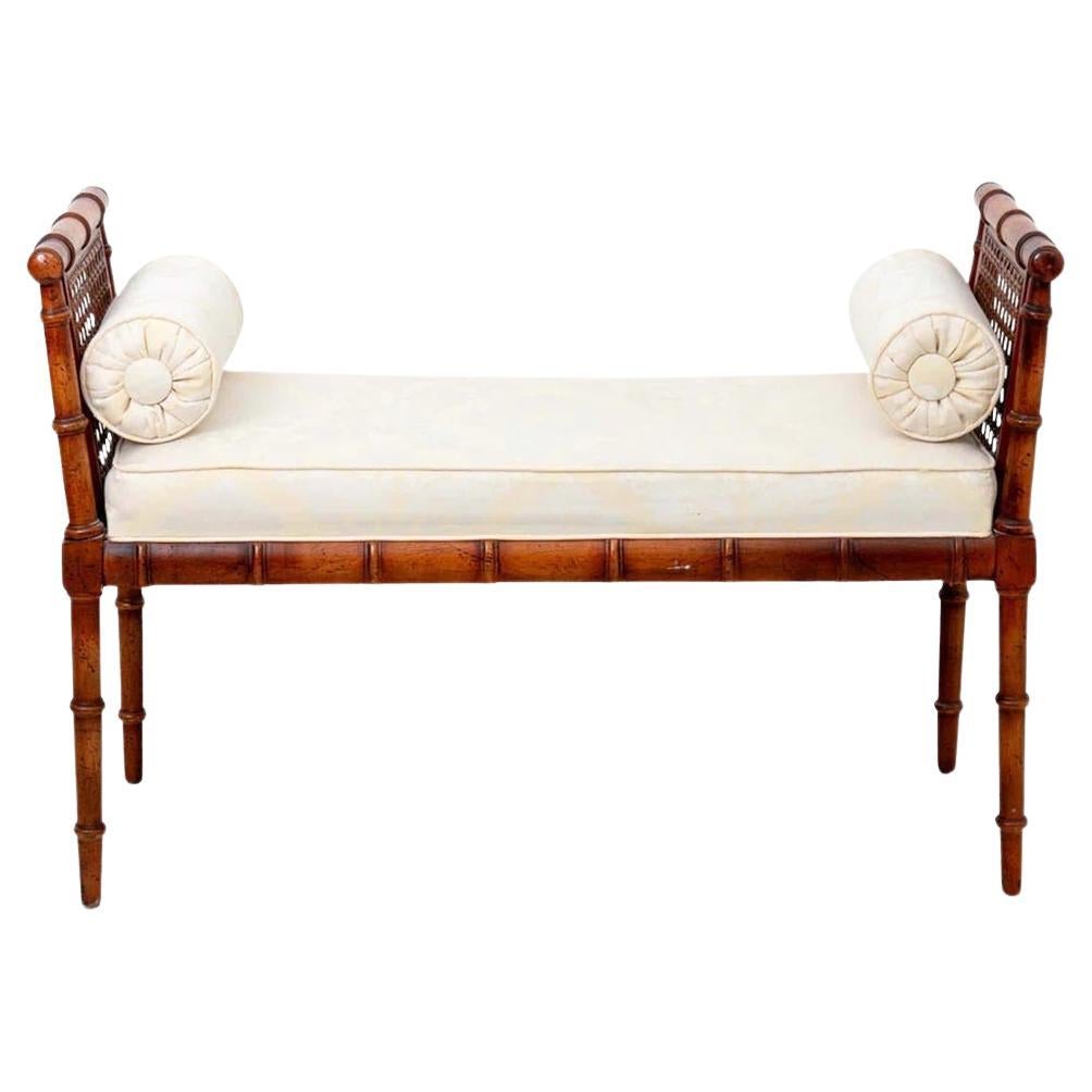 Hollywood Regency Wood Framed Faux Bamboo armed bench in original finish with upholstered seat and bolster pillows. Good overall condition. Can be used as is or reupholstered.