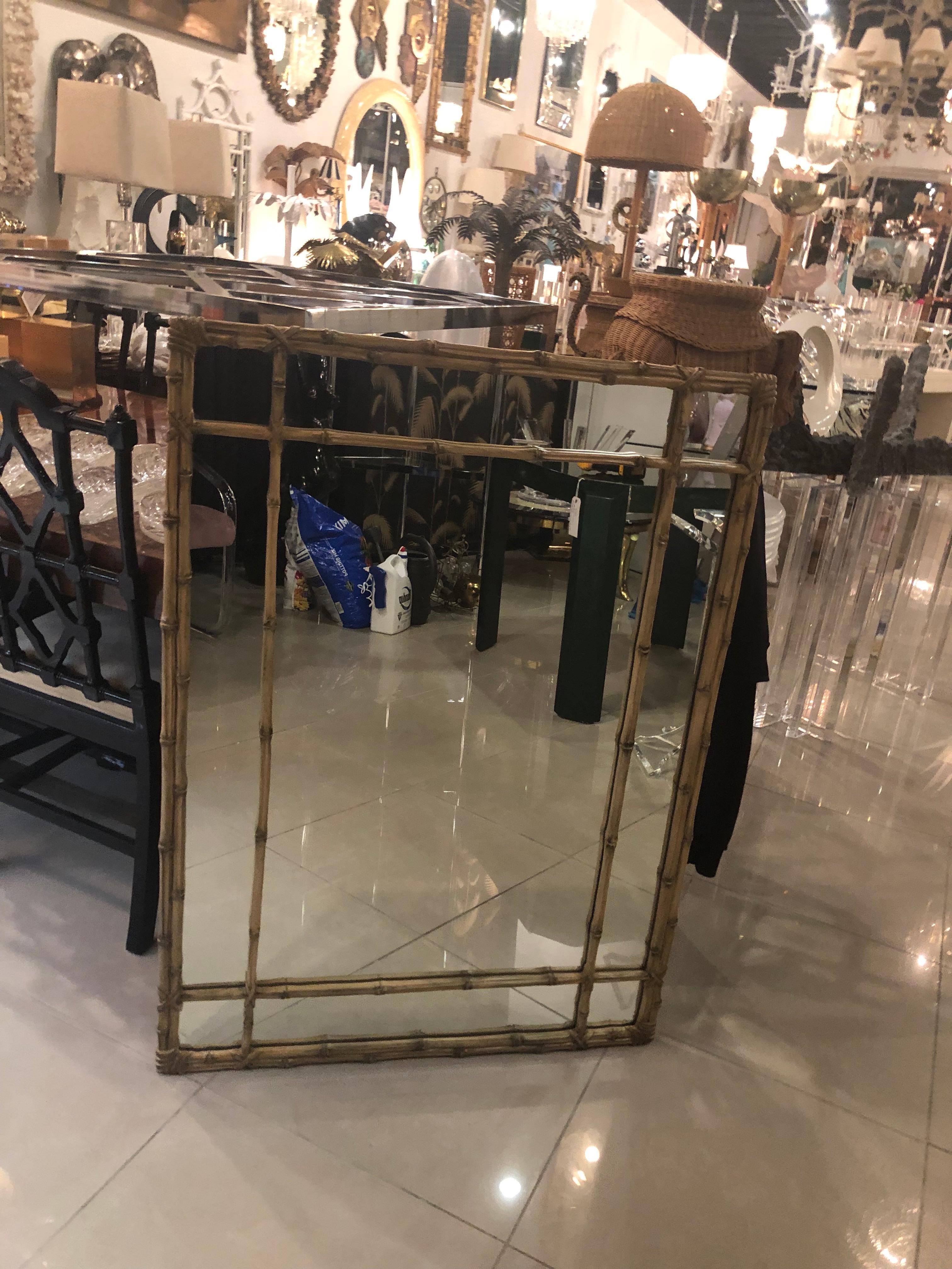 Lovely vintage faux bamboo Carvers Guild wall mirror. Original finish. Comes ready to hang. Can be lacquered at an additional cost.